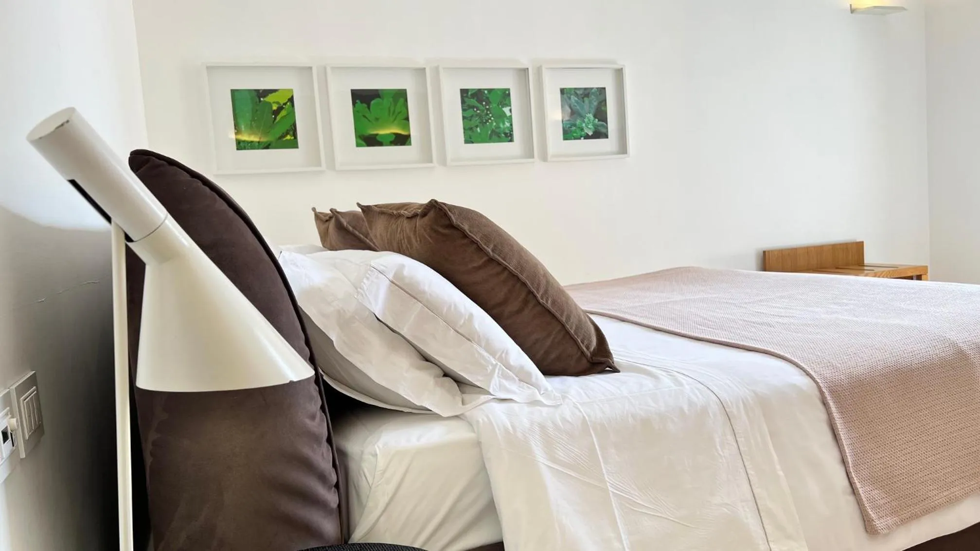 Bed in Santacroce Luxury Rooms