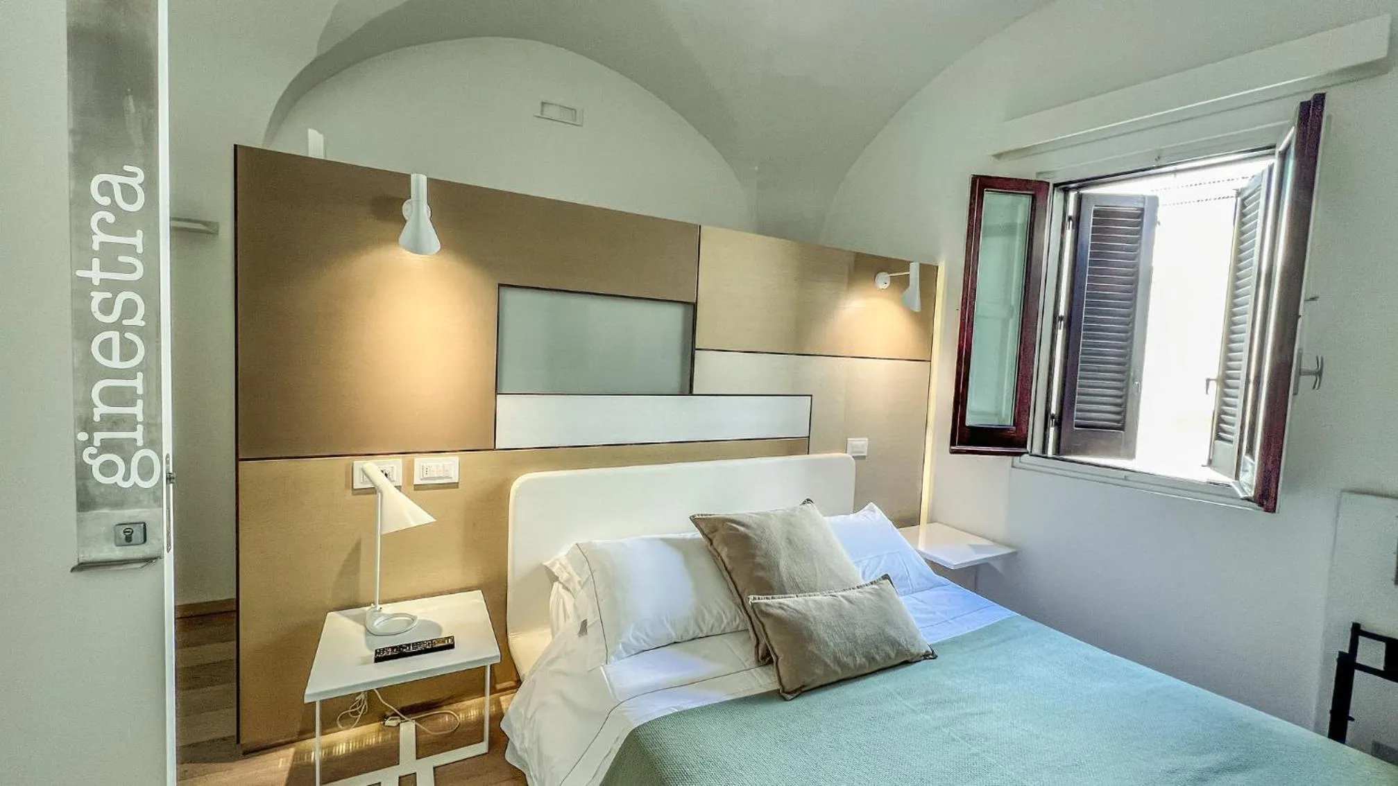 Bed in Santacroce Luxury Rooms