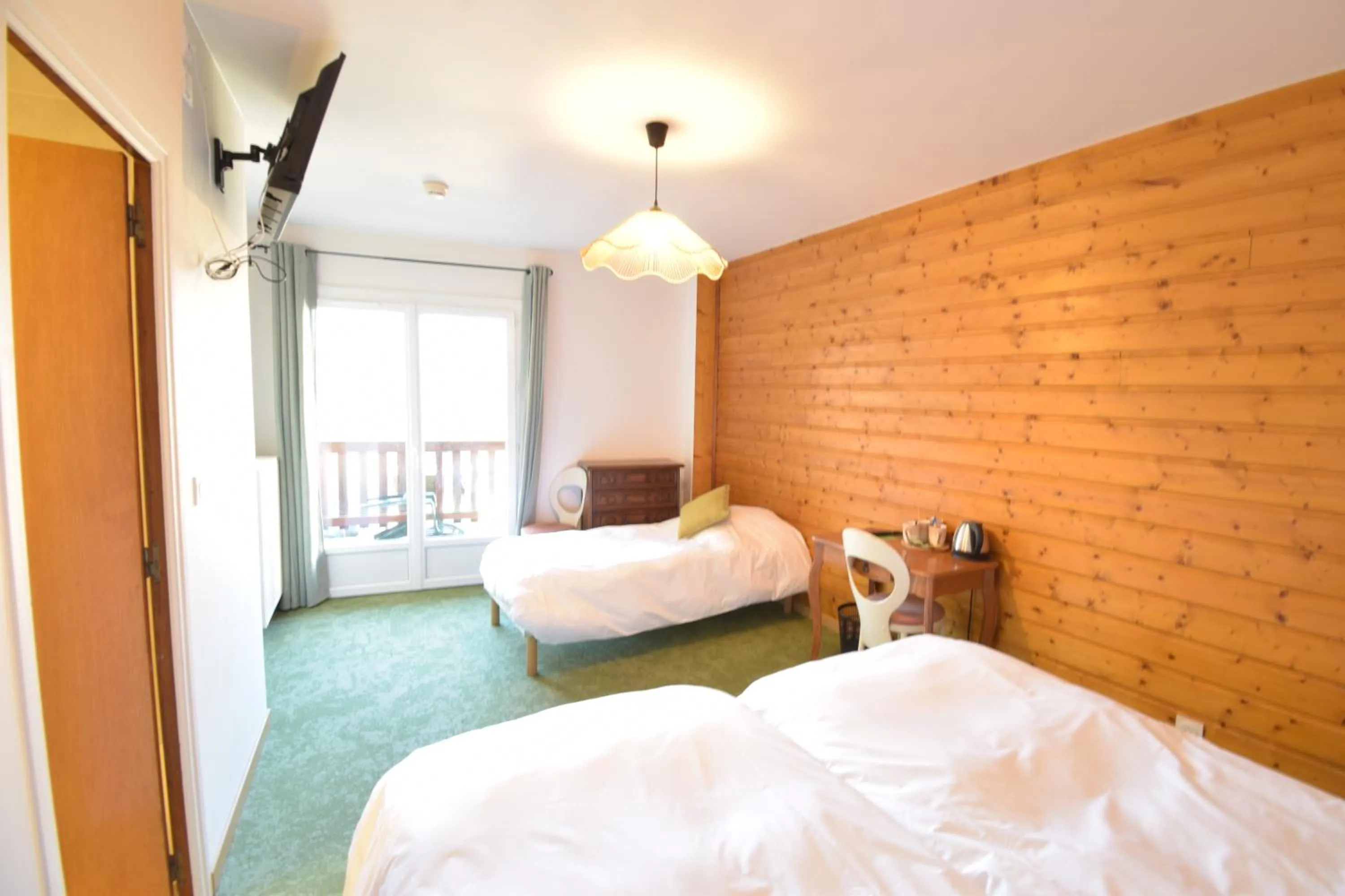 Bed in Hotel Les Chenets