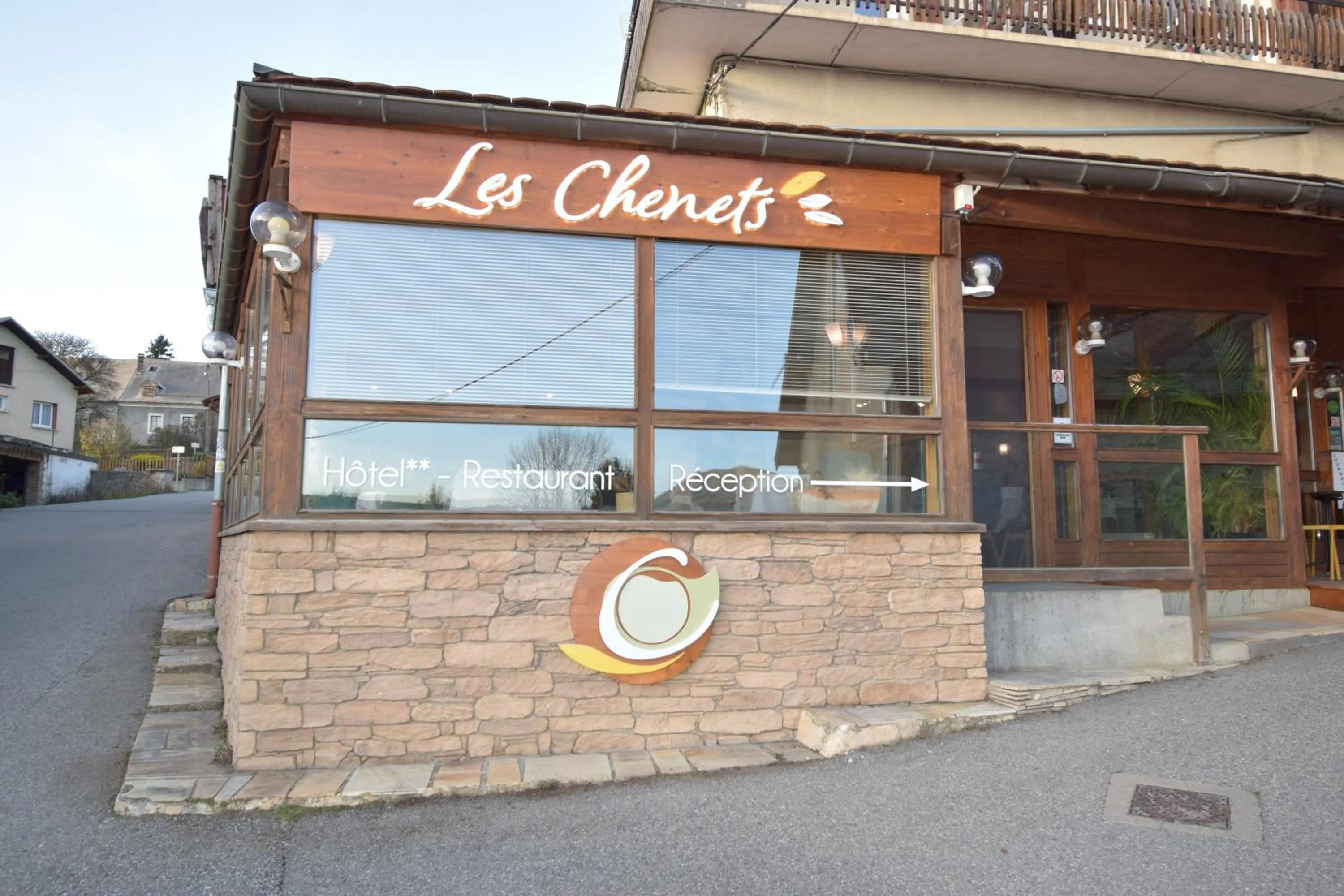 Property logo or sign in Hotel Les Chenets