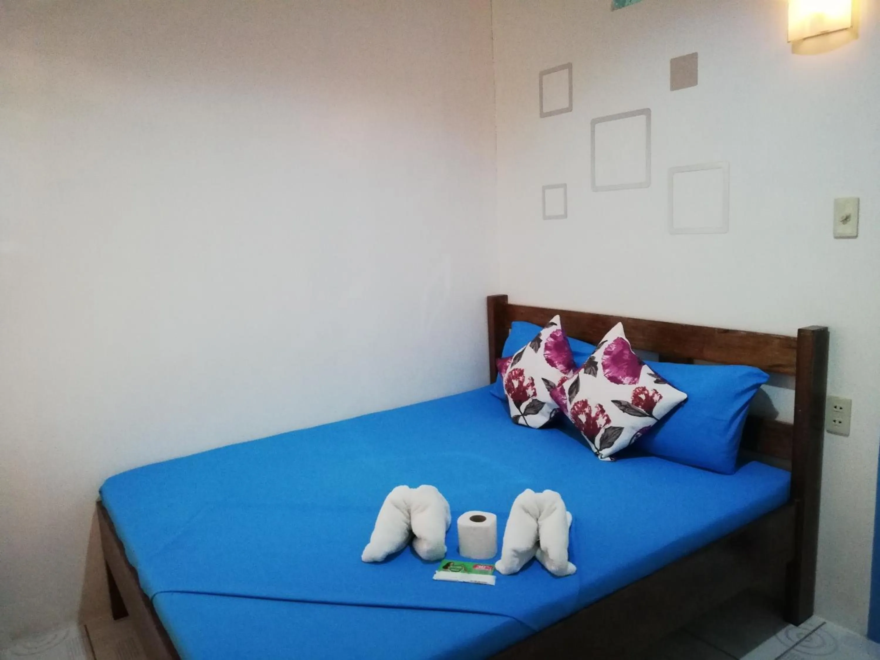 Bed in Hashtag Tourist Inn