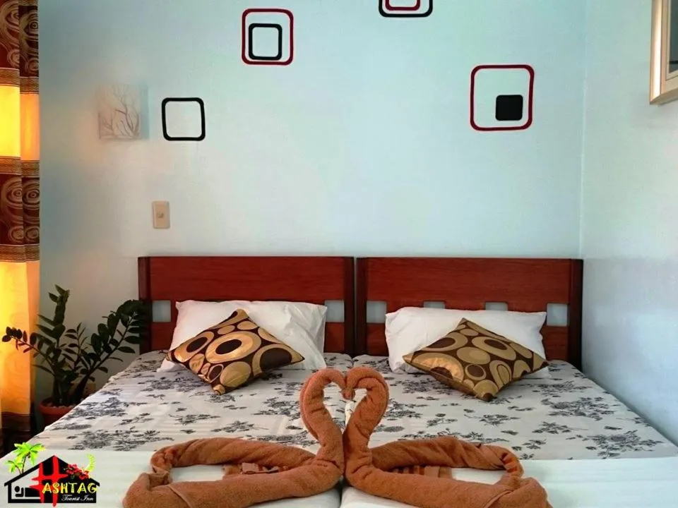 Bed in Hashtag Tourist Inn