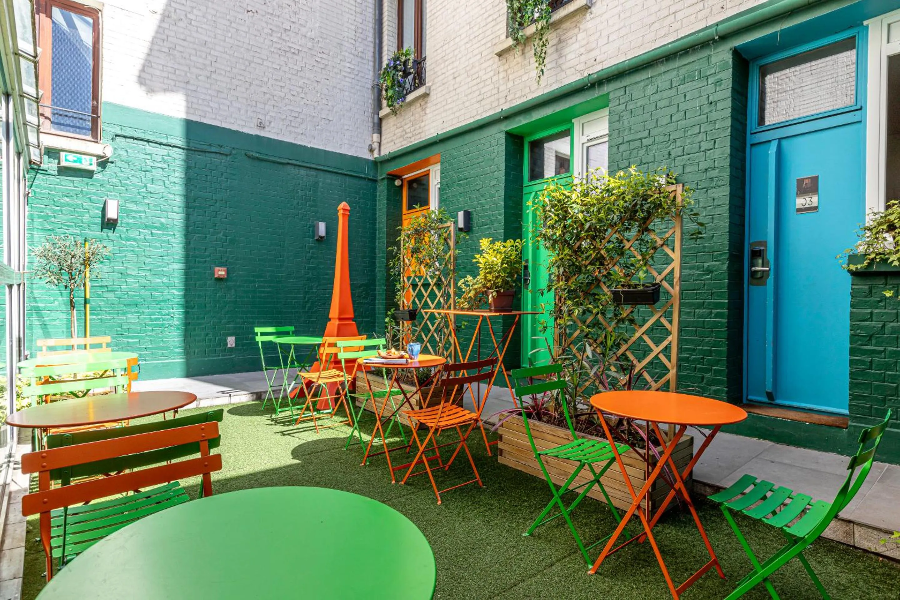 Patio in Hotel Alpha Paris Eiffel by Patrick Hayat