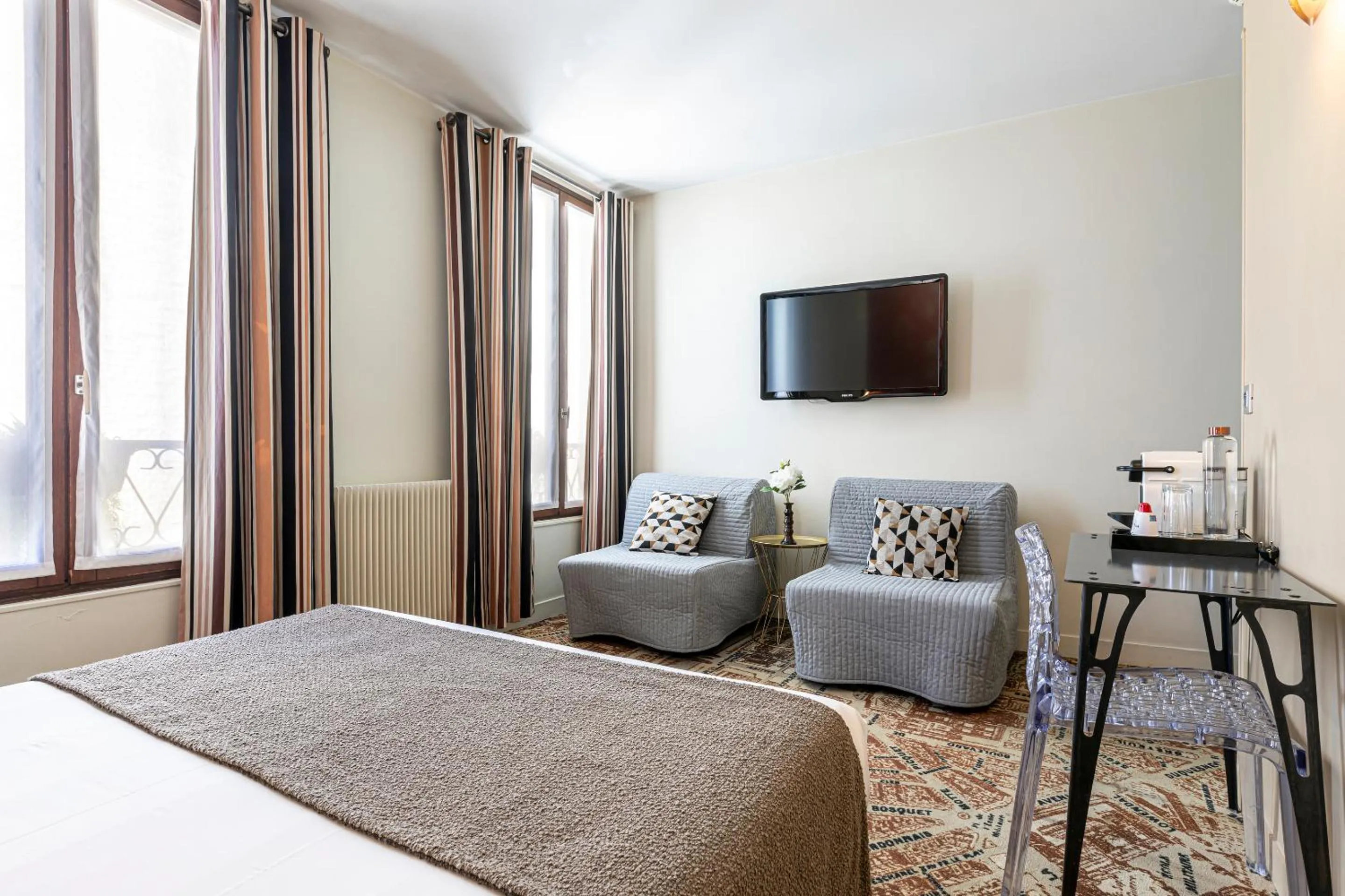 Bed in Hotel Alpha Paris Eiffel by Patrick Hayat