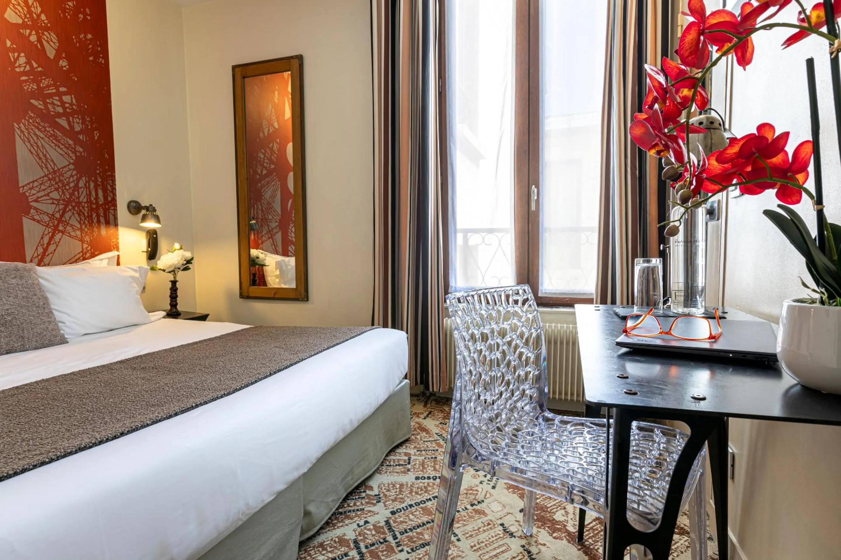 Bed in Hotel Alpha Paris Eiffel by Patrick Hayat