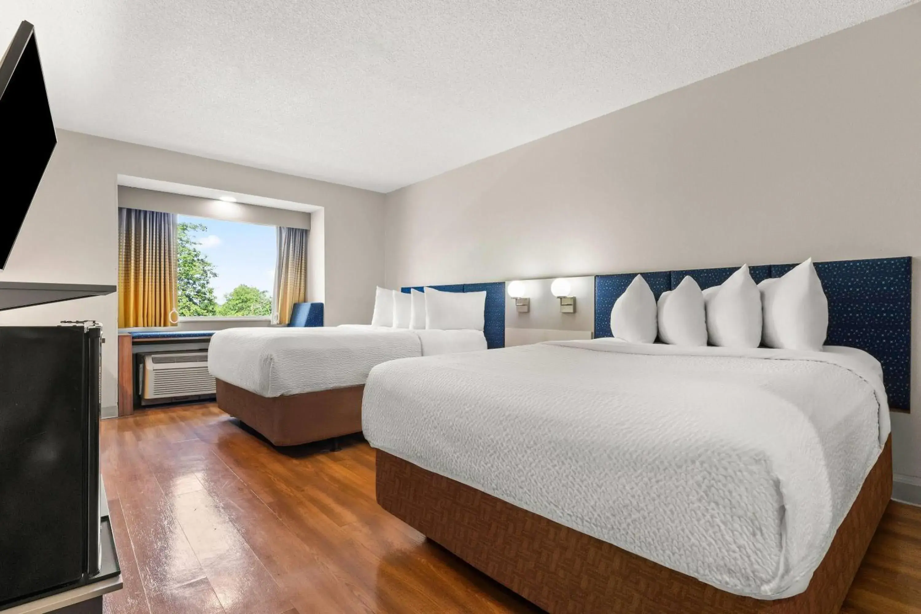 Queen Room with Two Queen Beds and Roll-in Shower - Mobility Accessible/Non-Smoking in Microtel Inn and Suites - Salisbury Queen Room with Two Queen Beds and Roll-in Shower - Mobility Accessible/Non-Smoking in Microtel Inn and Suites - Salisbury