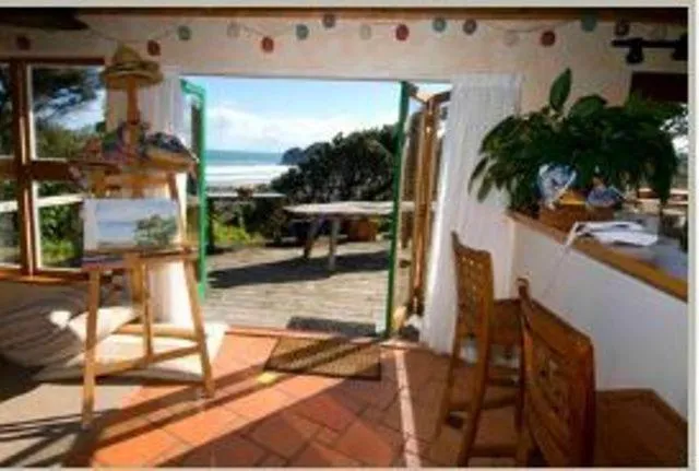 Day in Bethells Beach Cottages