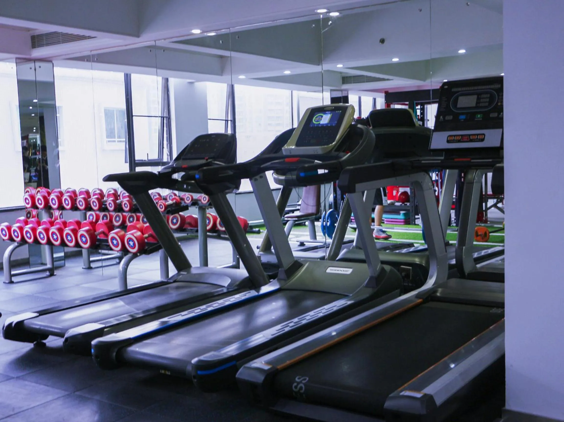 Fitness centre/facilities in La Perle International Hotel