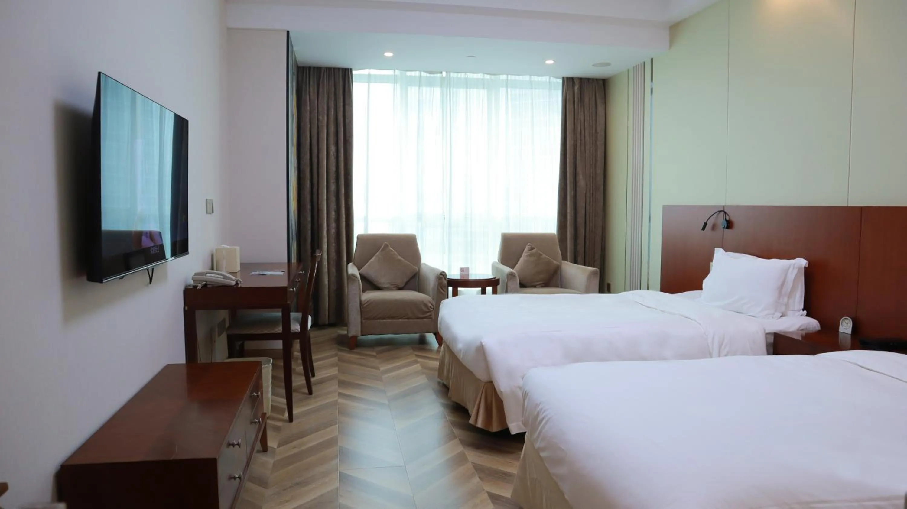 Bed in Shanghai Metropark Jichen Hotel