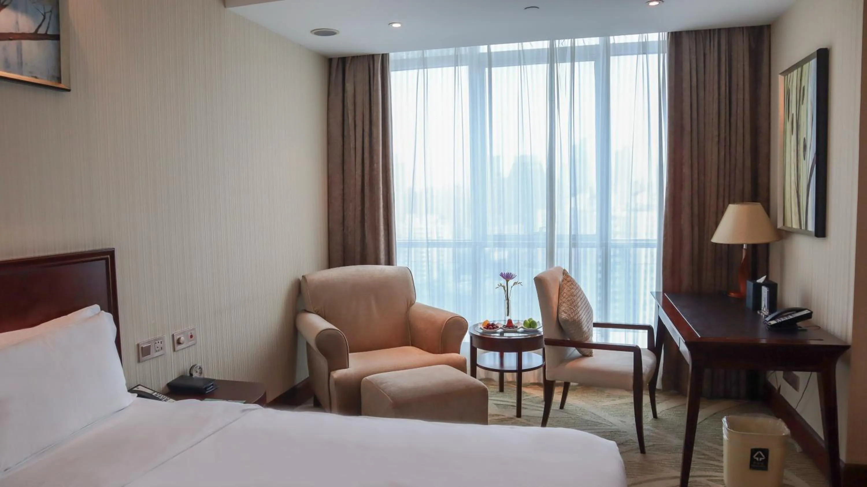 Bed in Shanghai Metropark Jichen Hotel