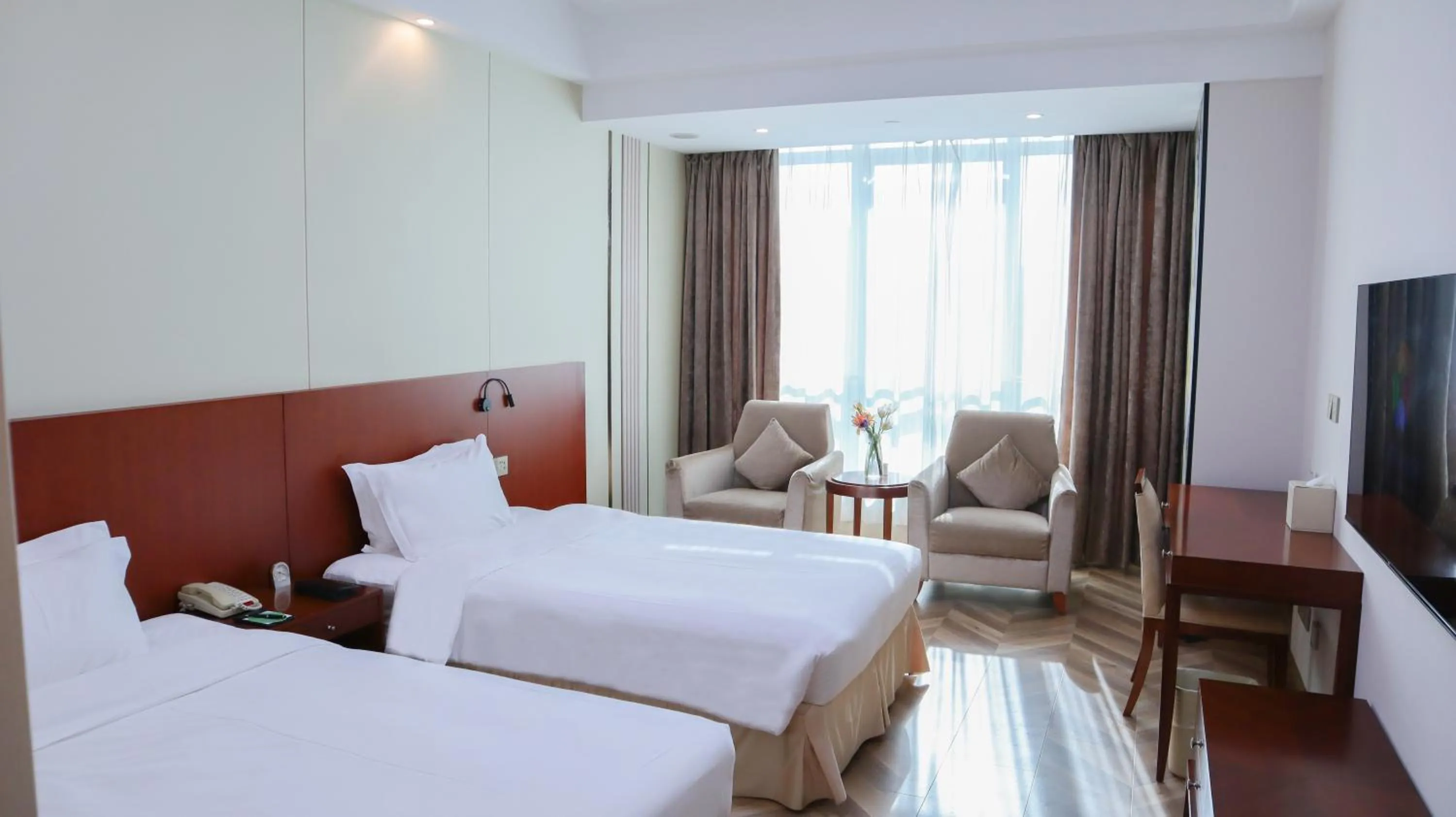 Bed in Shanghai Metropark Jichen Hotel