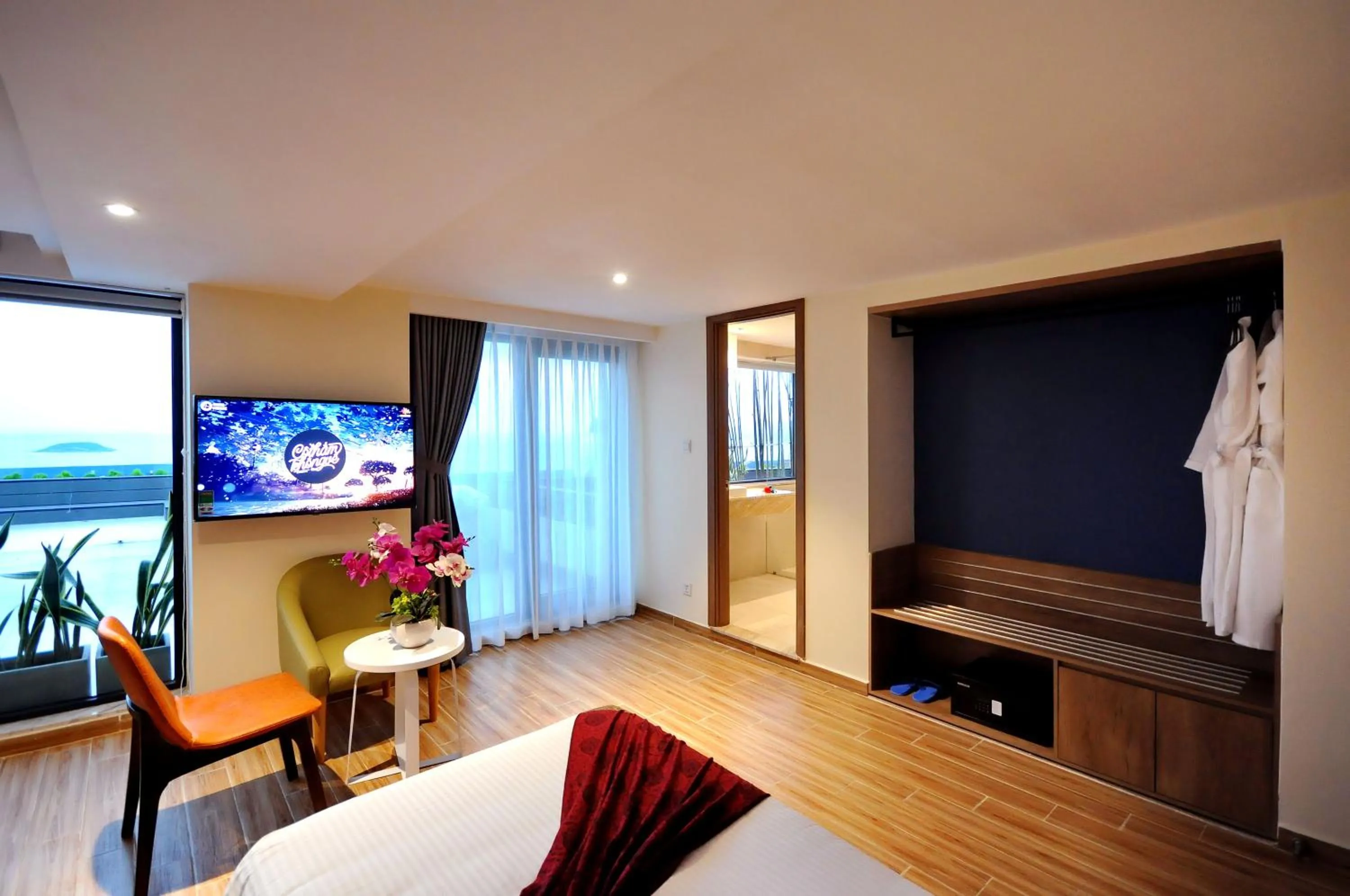 Communal lounge/ TV room, Bed in Anrizon Hotel Nha Trang