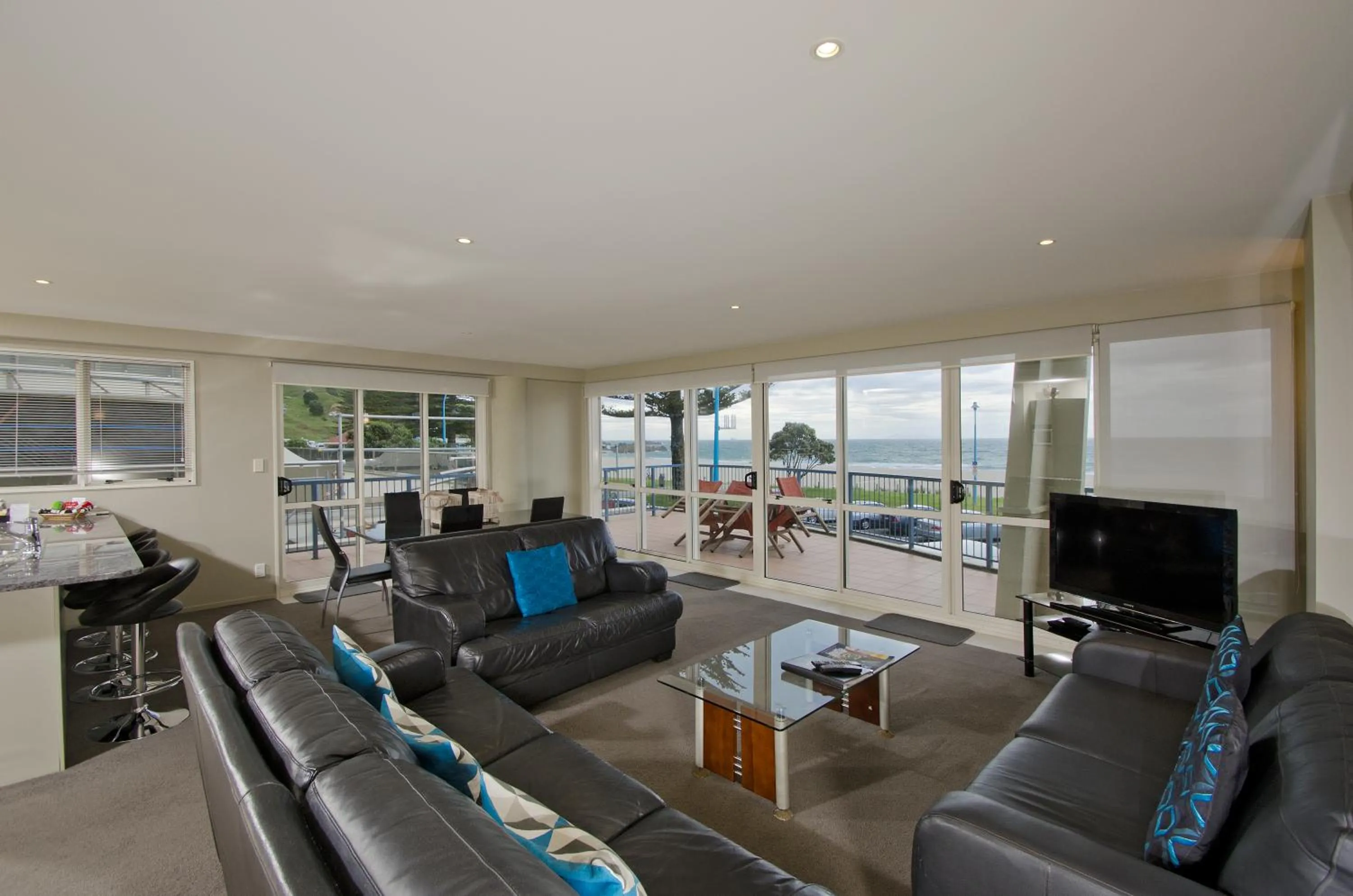 Living room in Pavilion Beachfront Apartments