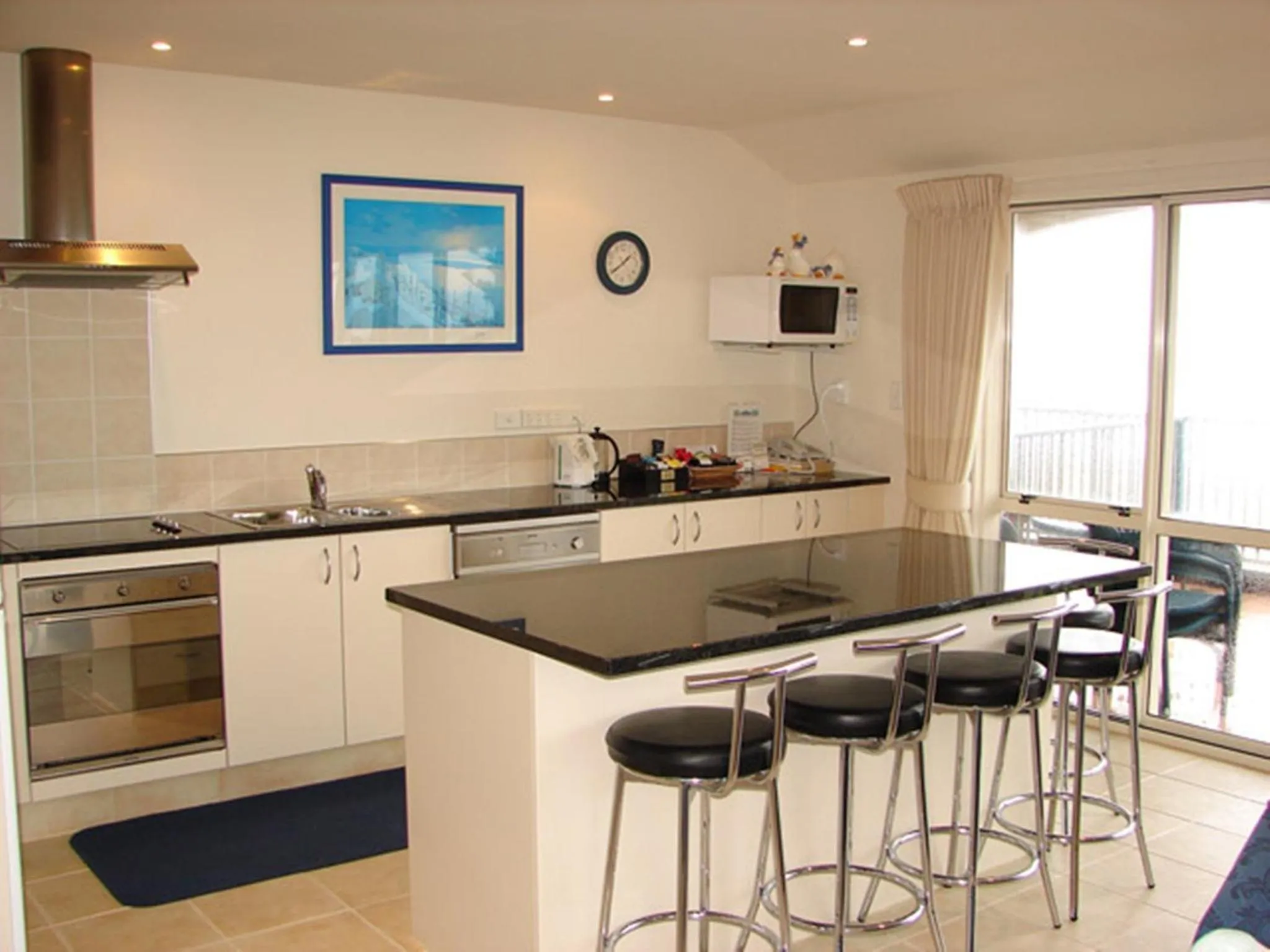 Kitchen or kitchenette in Pavilion Beachfront Apartments