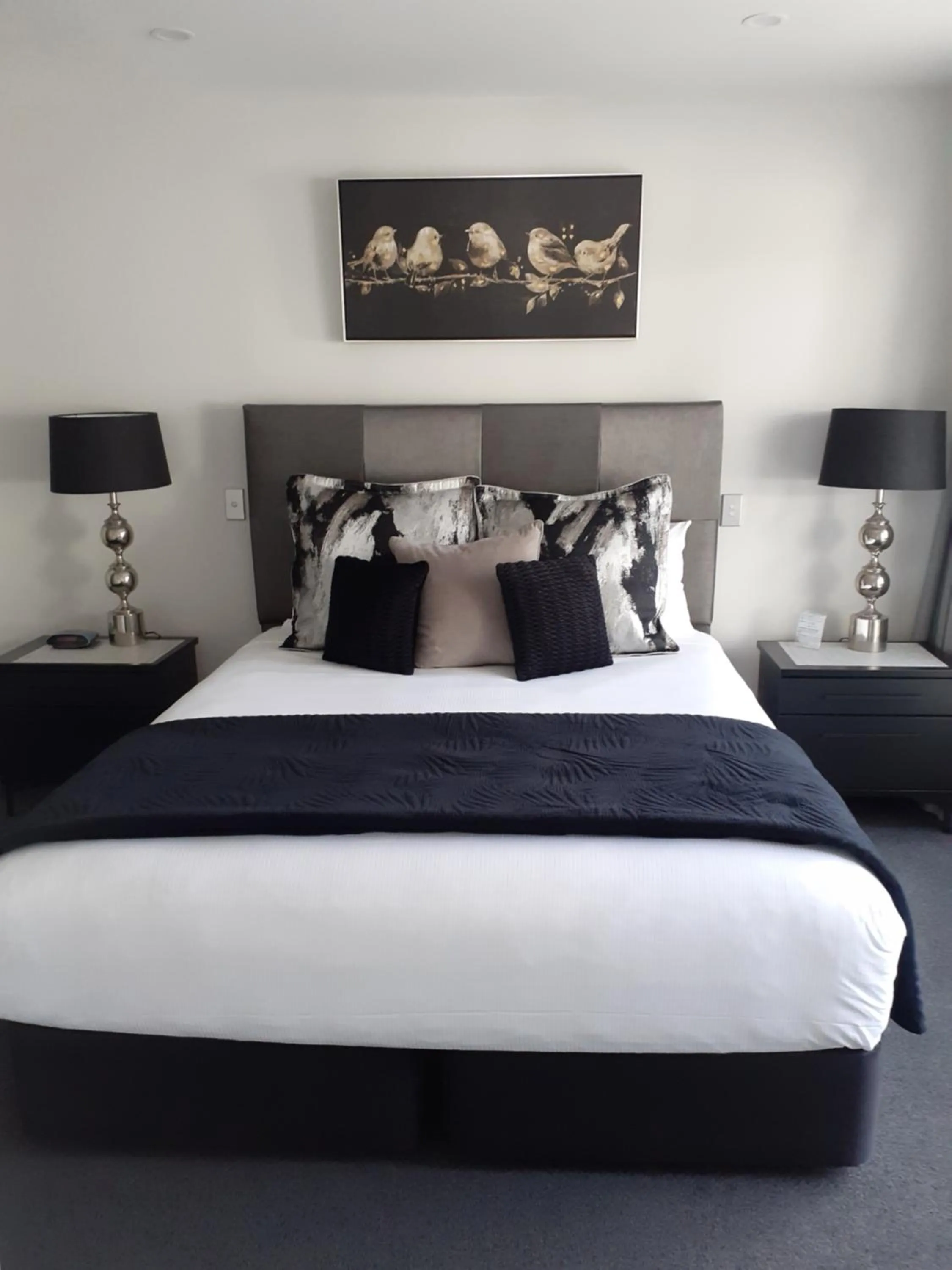 Bed in Pavilion Beachfront Apartments