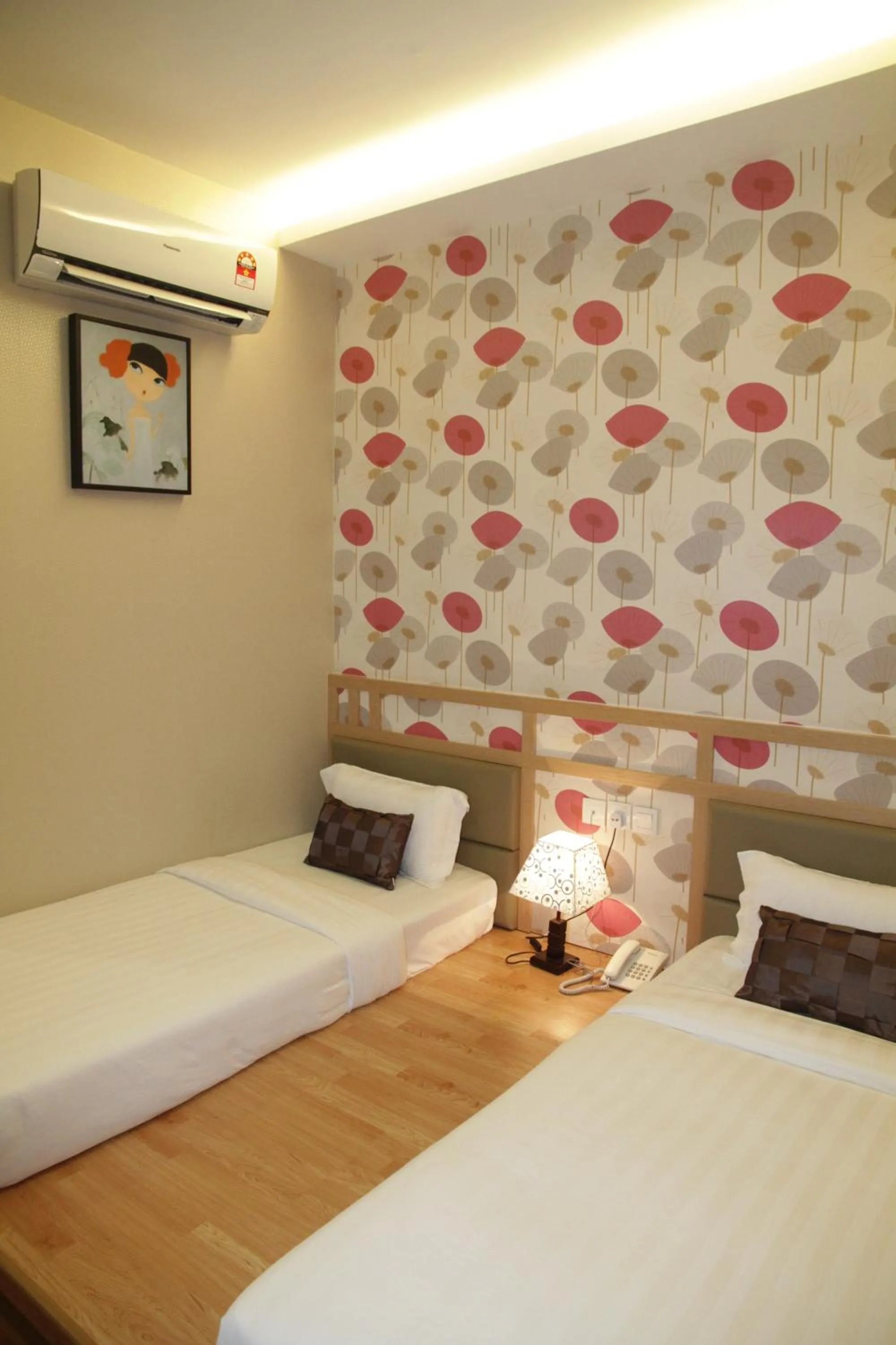 Bed in De Residence Hotel