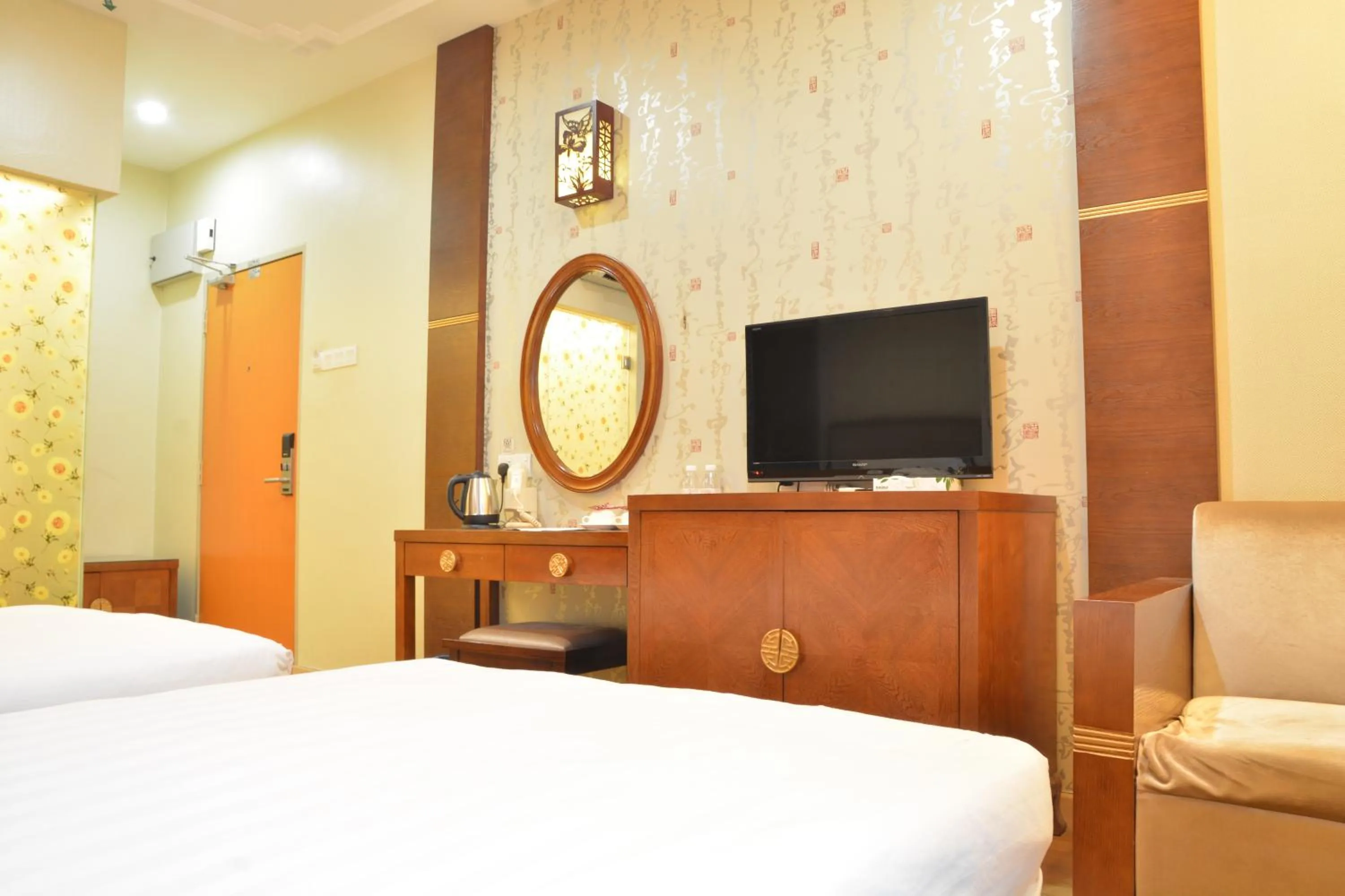 Bed in De Residence Hotel