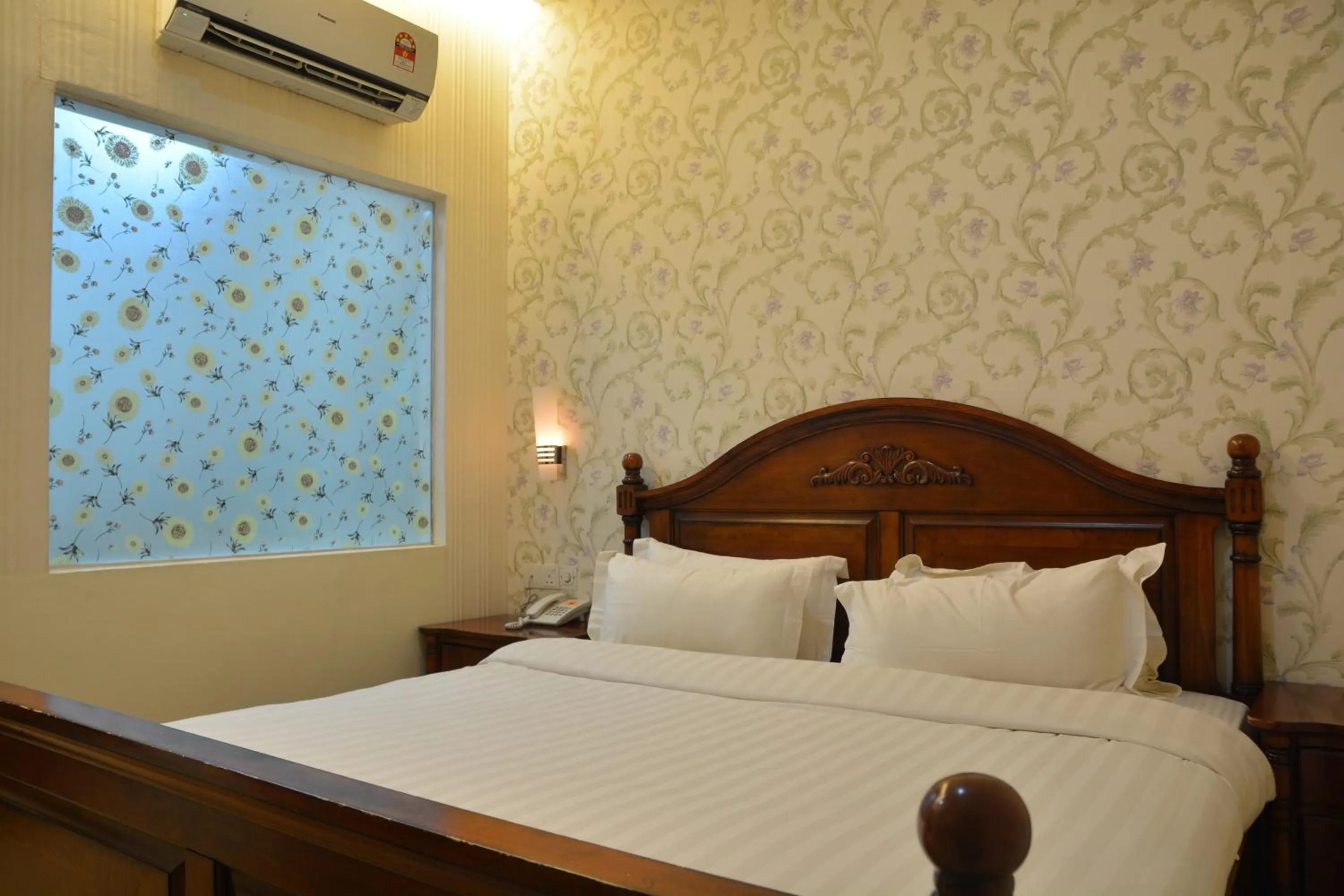 Bed in De Residence Hotel