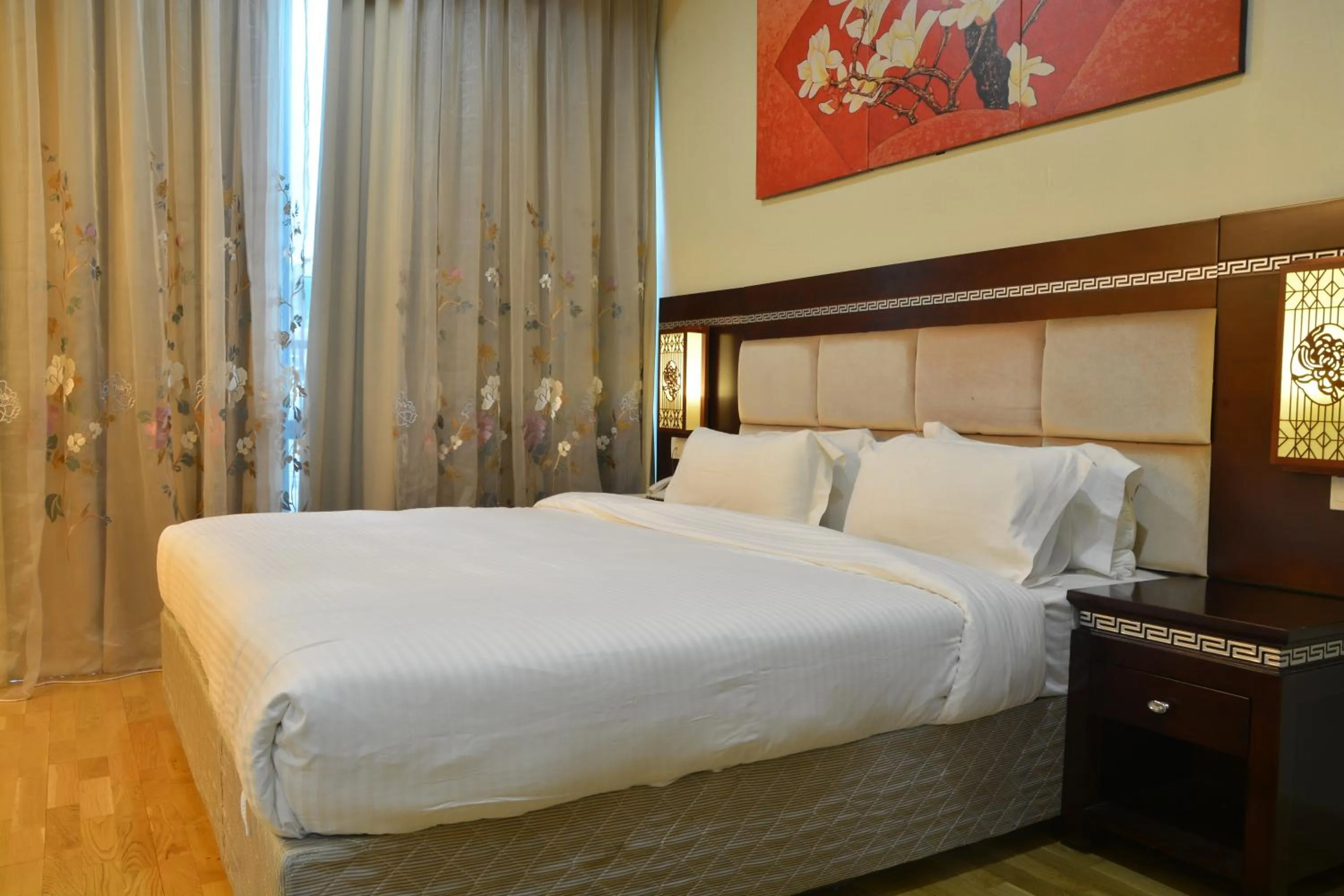 Bed in De Residence Hotel