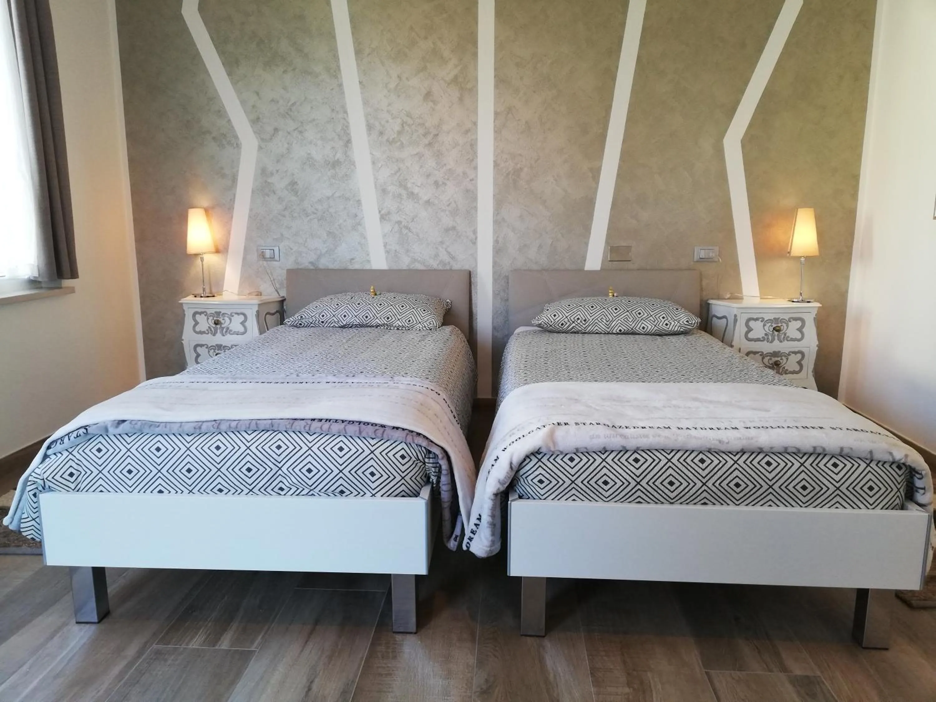 Bed in B&B Villa Pelèr