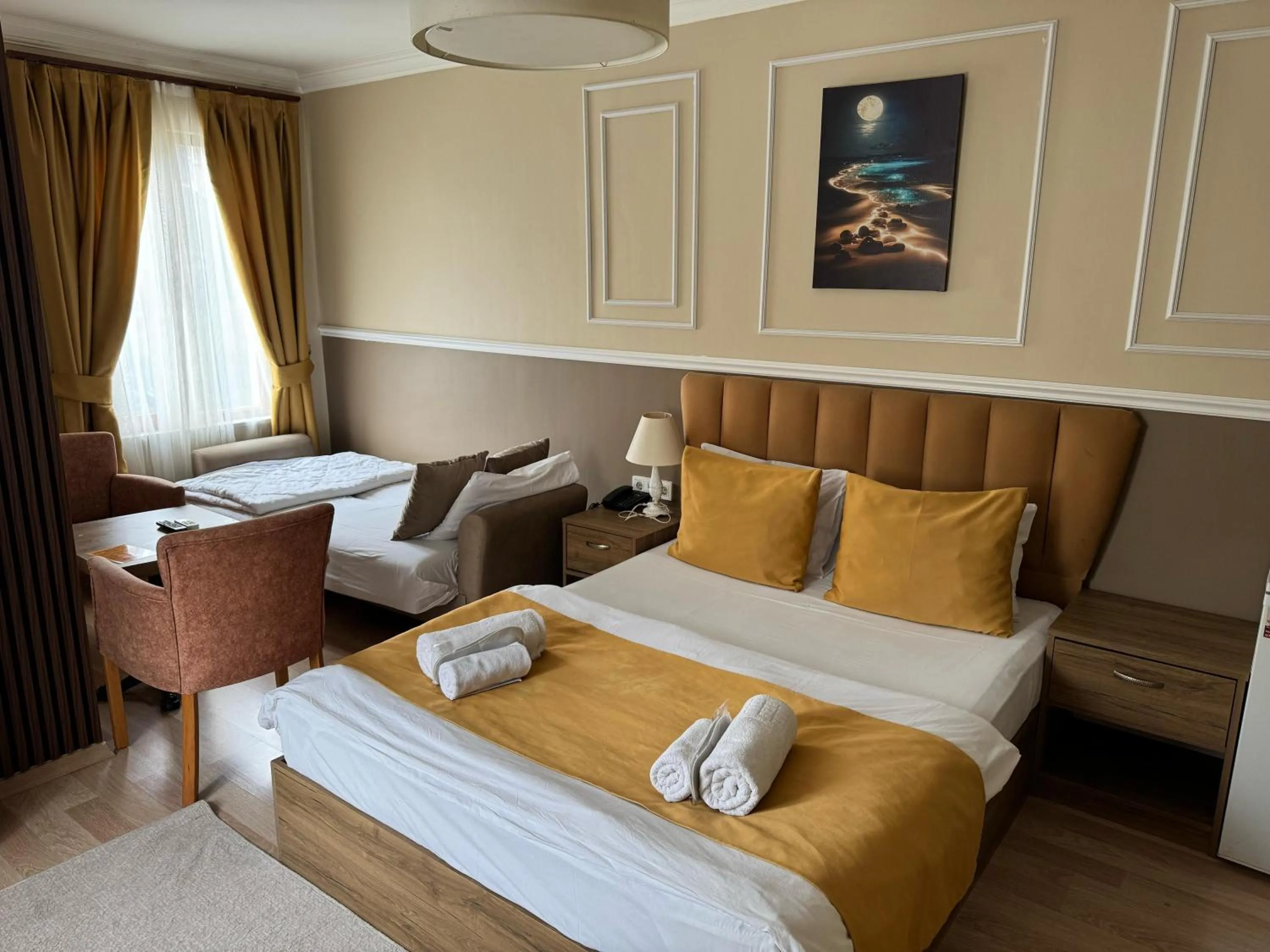 Bed in NEW BEYLERBEYİ HOTEL