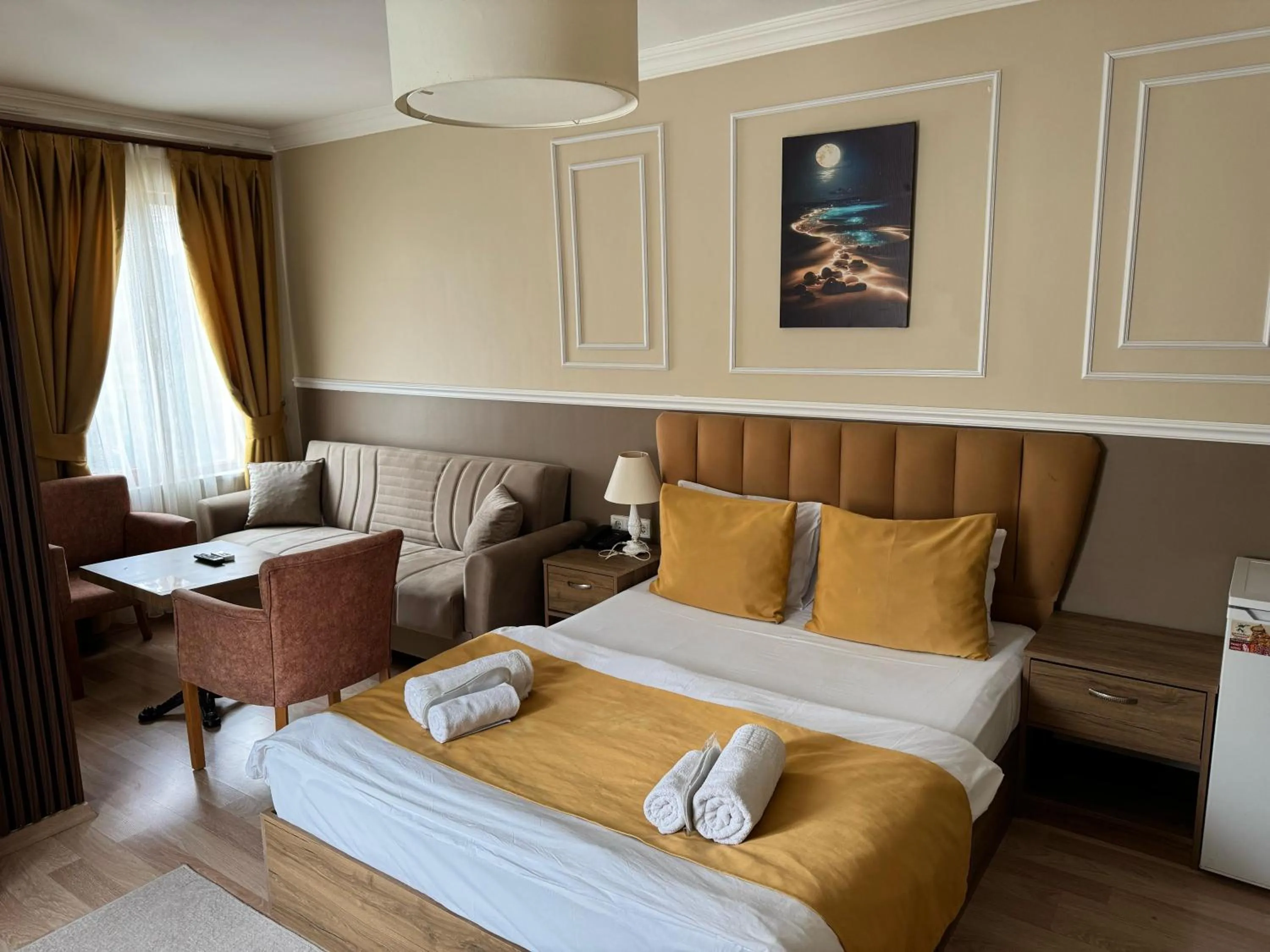 Bed in NEW BEYLERBEYİ HOTEL