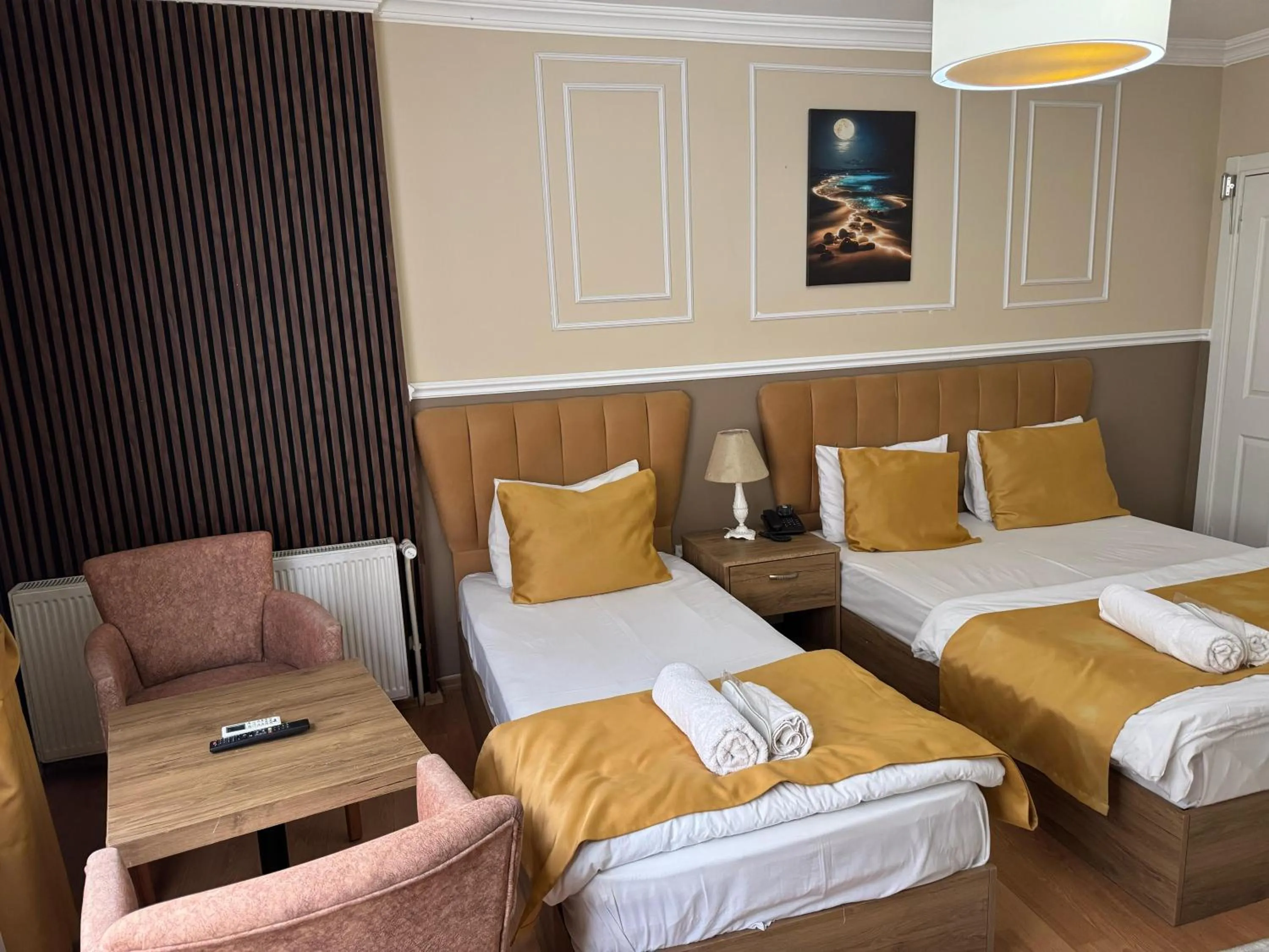 Bed in NEW BEYLERBEYİ HOTEL