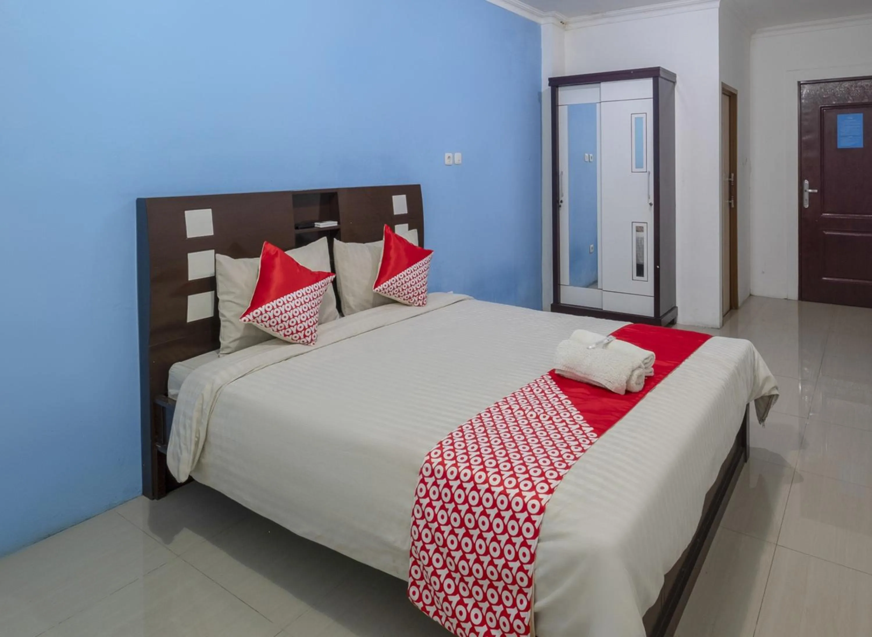 Photo of the whole room, Bed in Hotel O Cibubur Near Cibubur Junction Formerly Comfort Residence