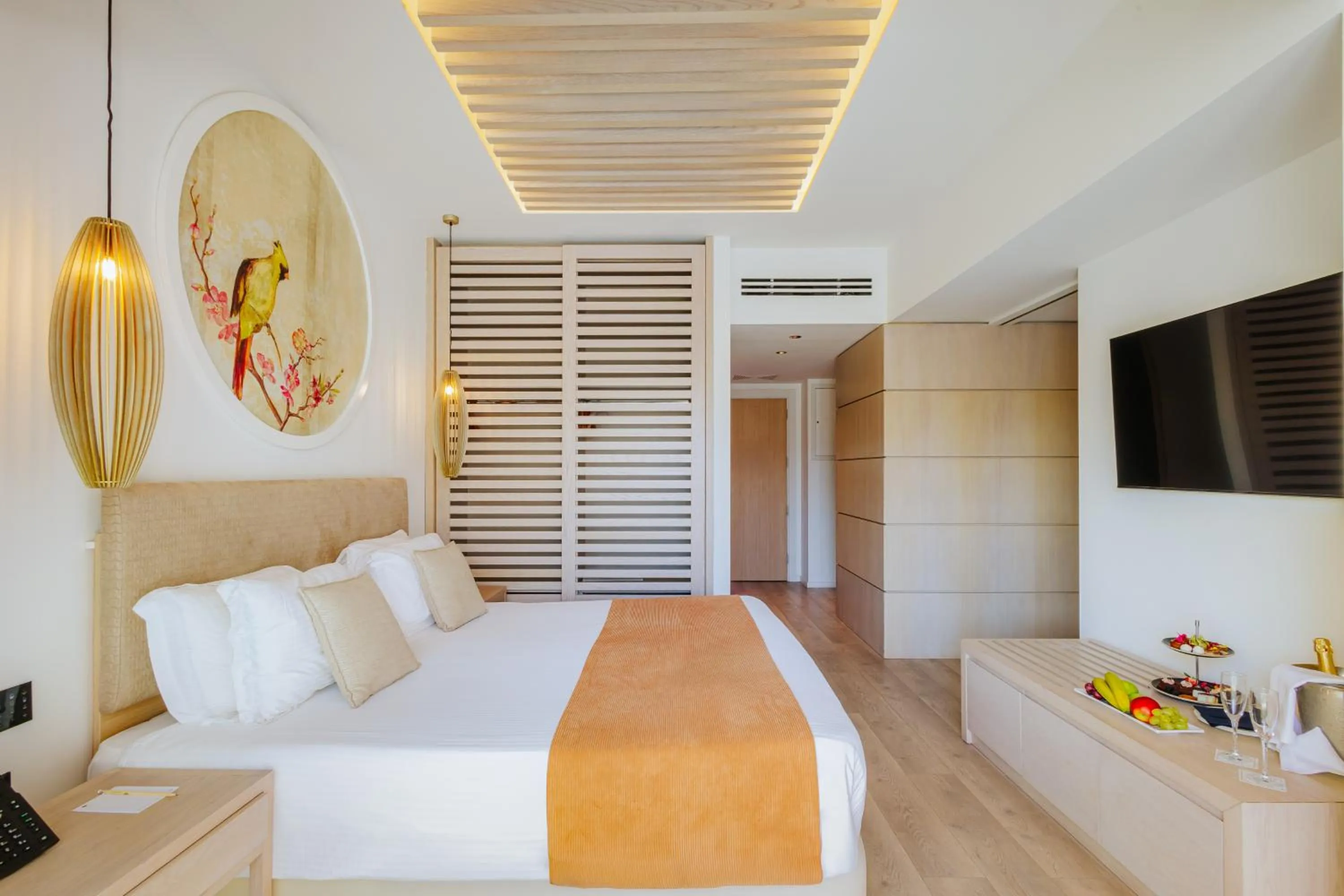 Bed in NissiBlu Beach Resort