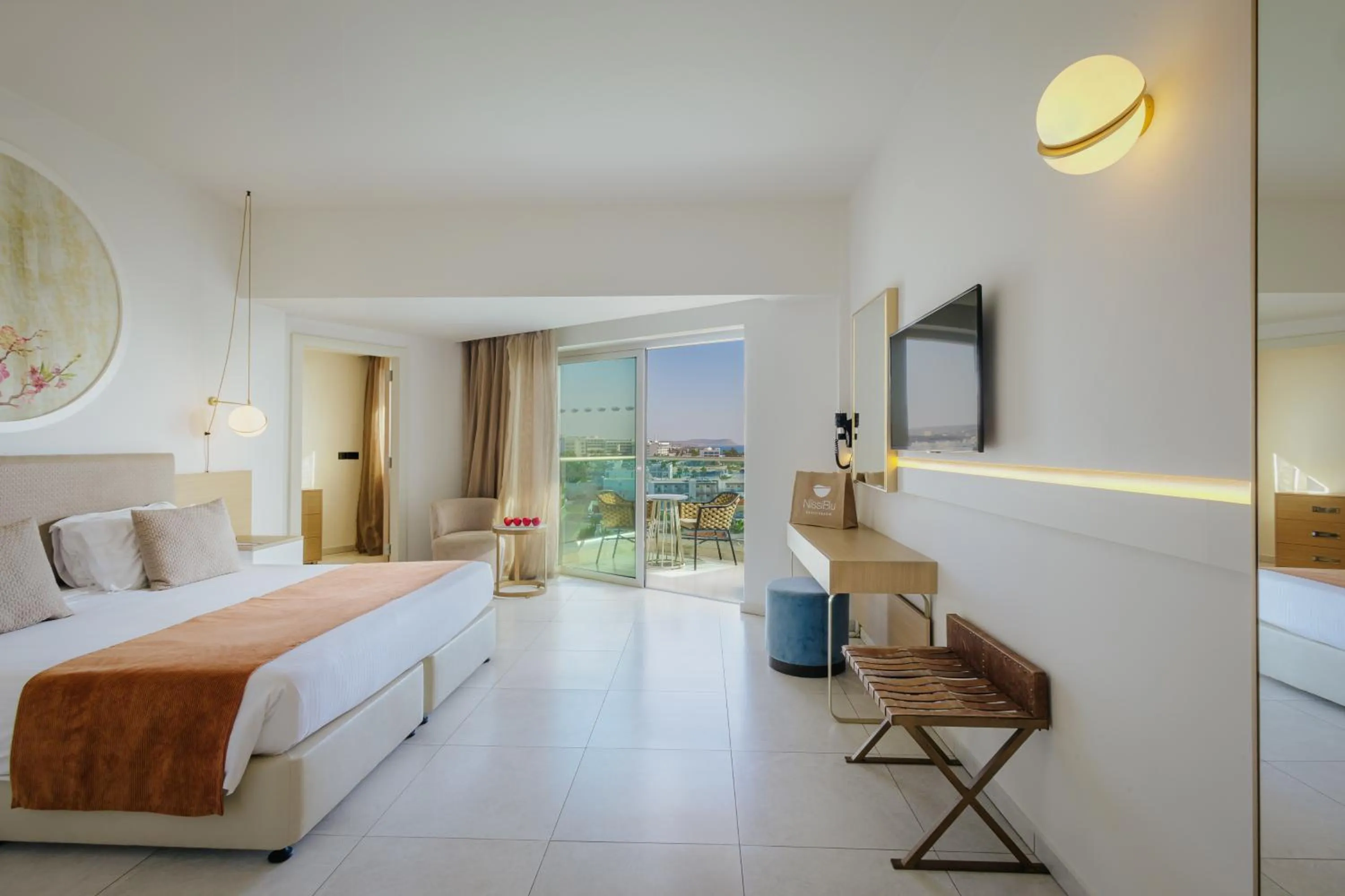 Bed in NissiBlu Beach Resort