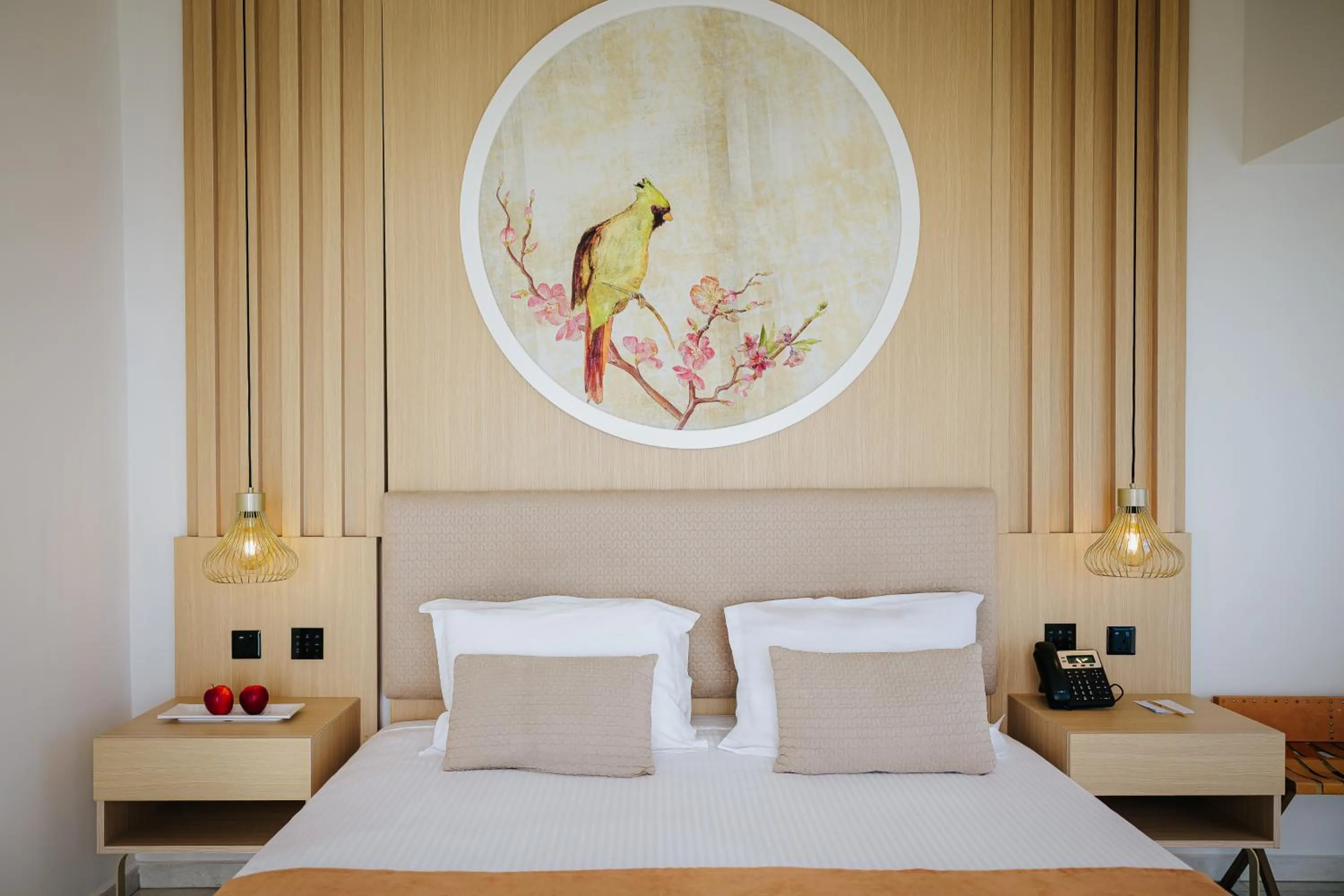 Bed in NissiBlu Beach Resort