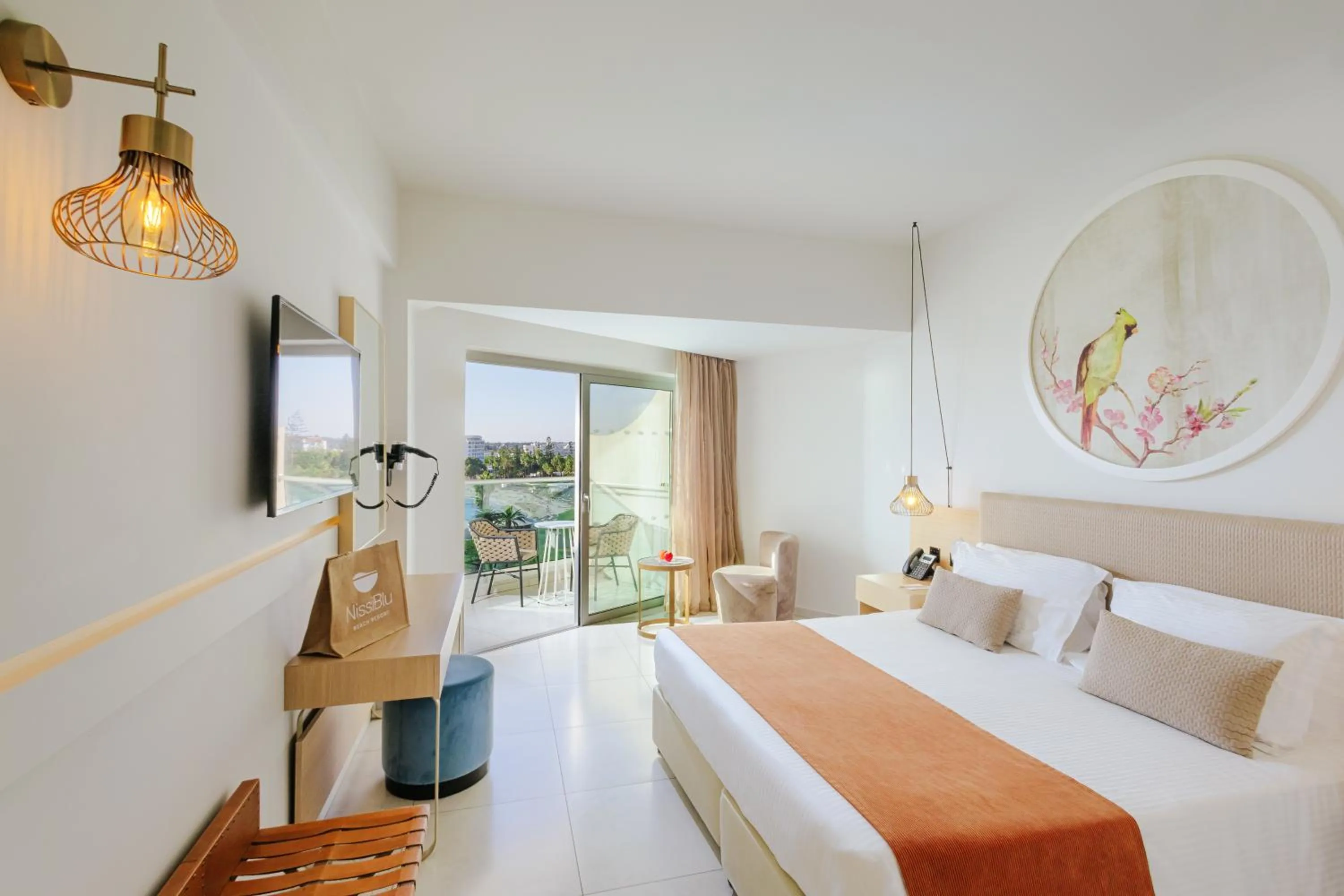 Bed in NissiBlu Beach Resort