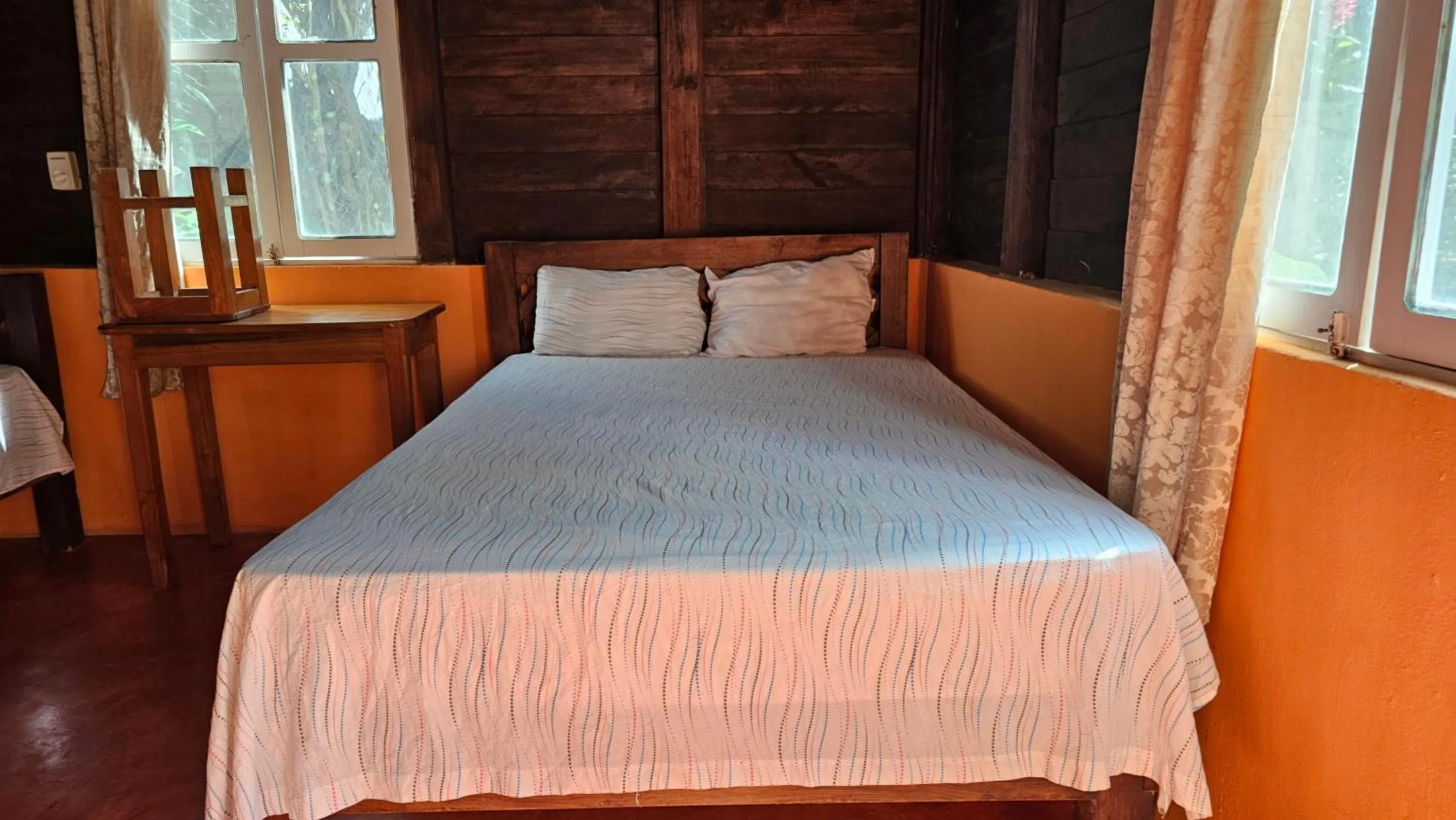 Bed in Cabañas Yax-ha