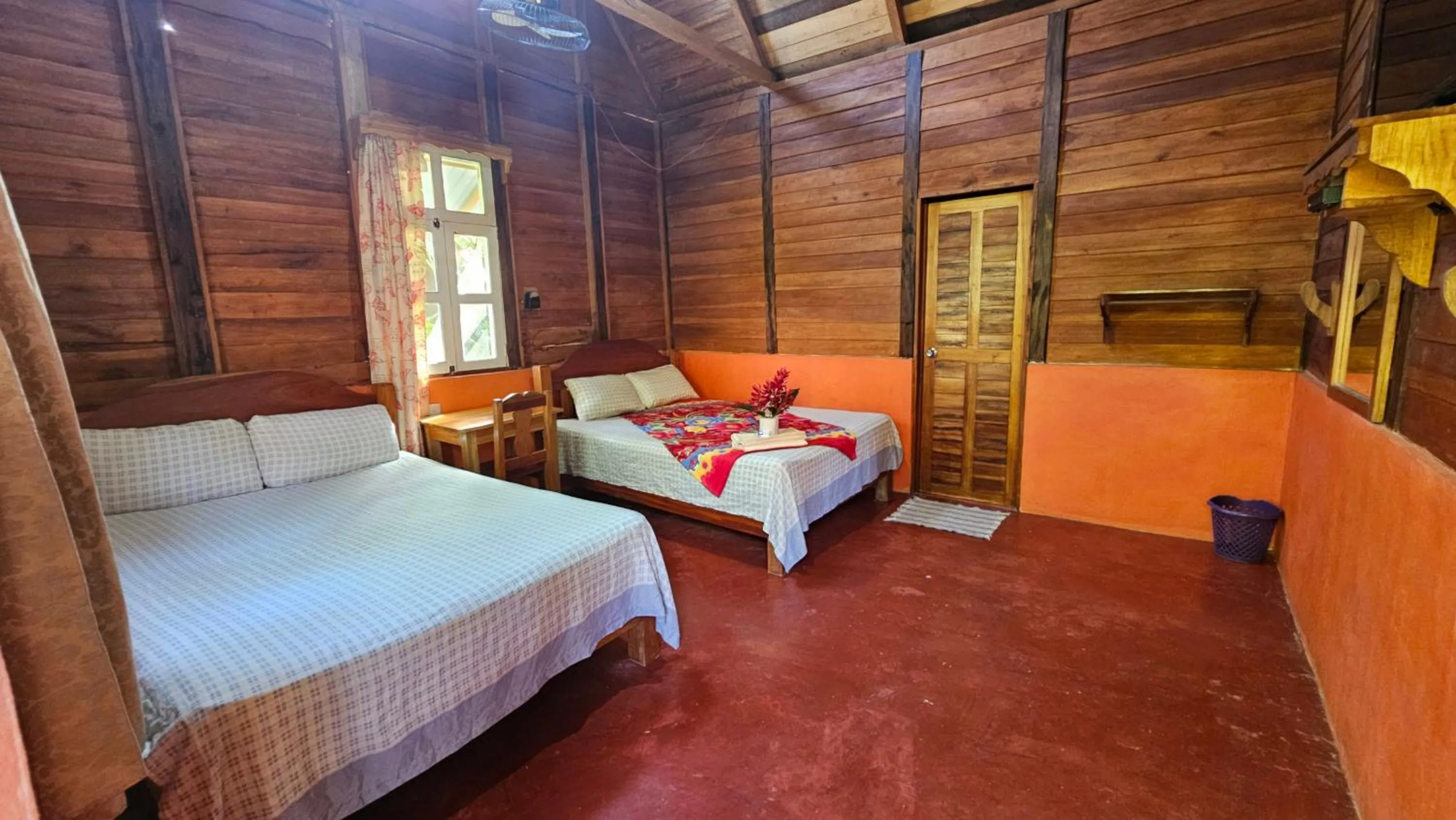 Bed in Cabañas Yax-ha