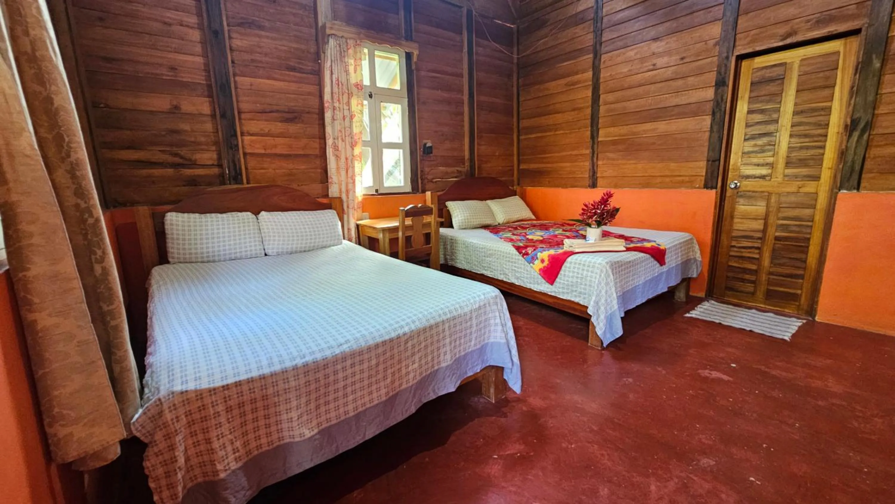 Bed in Cabañas Yax-ha