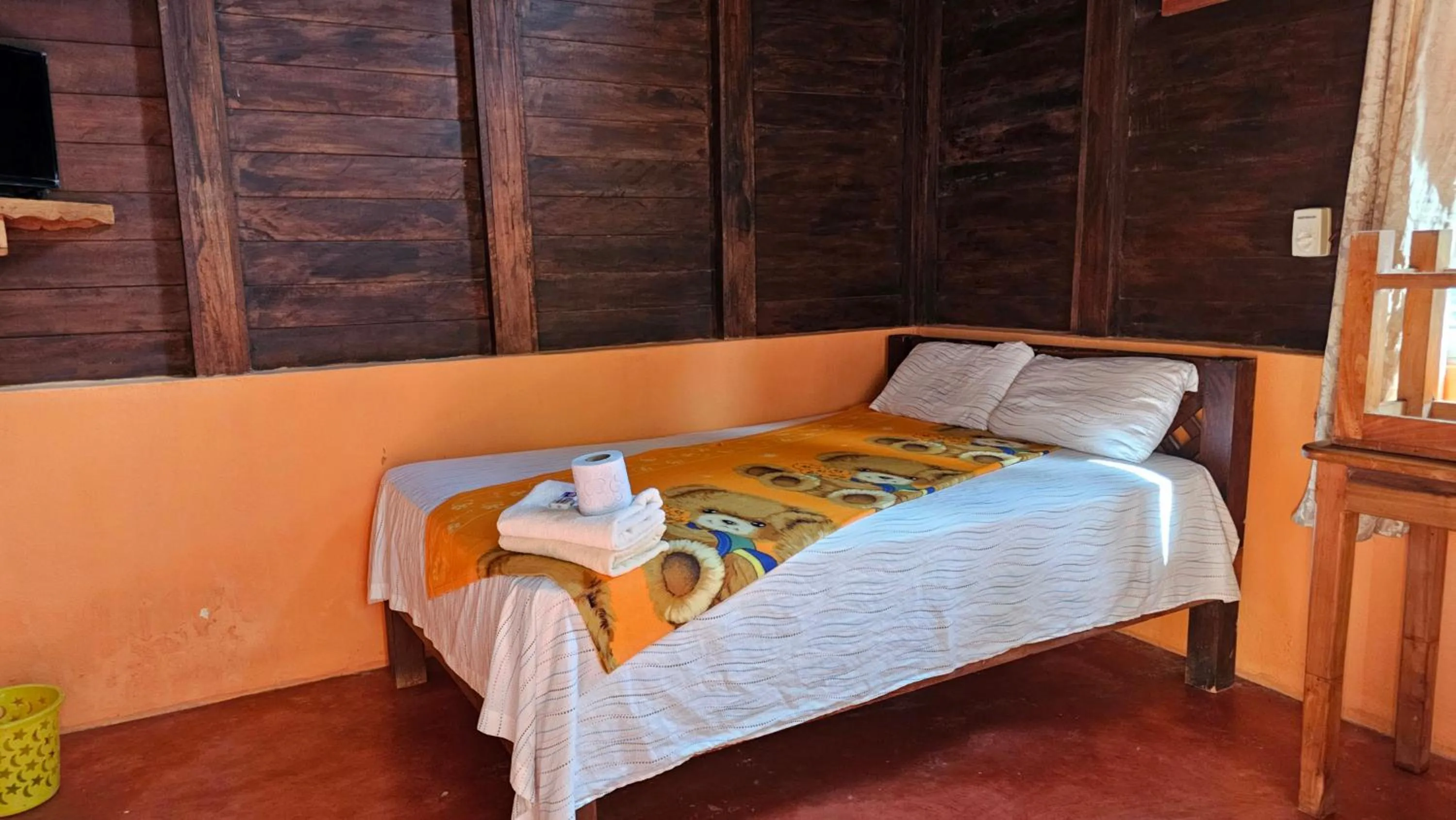 Bed in Cabañas Yax-ha