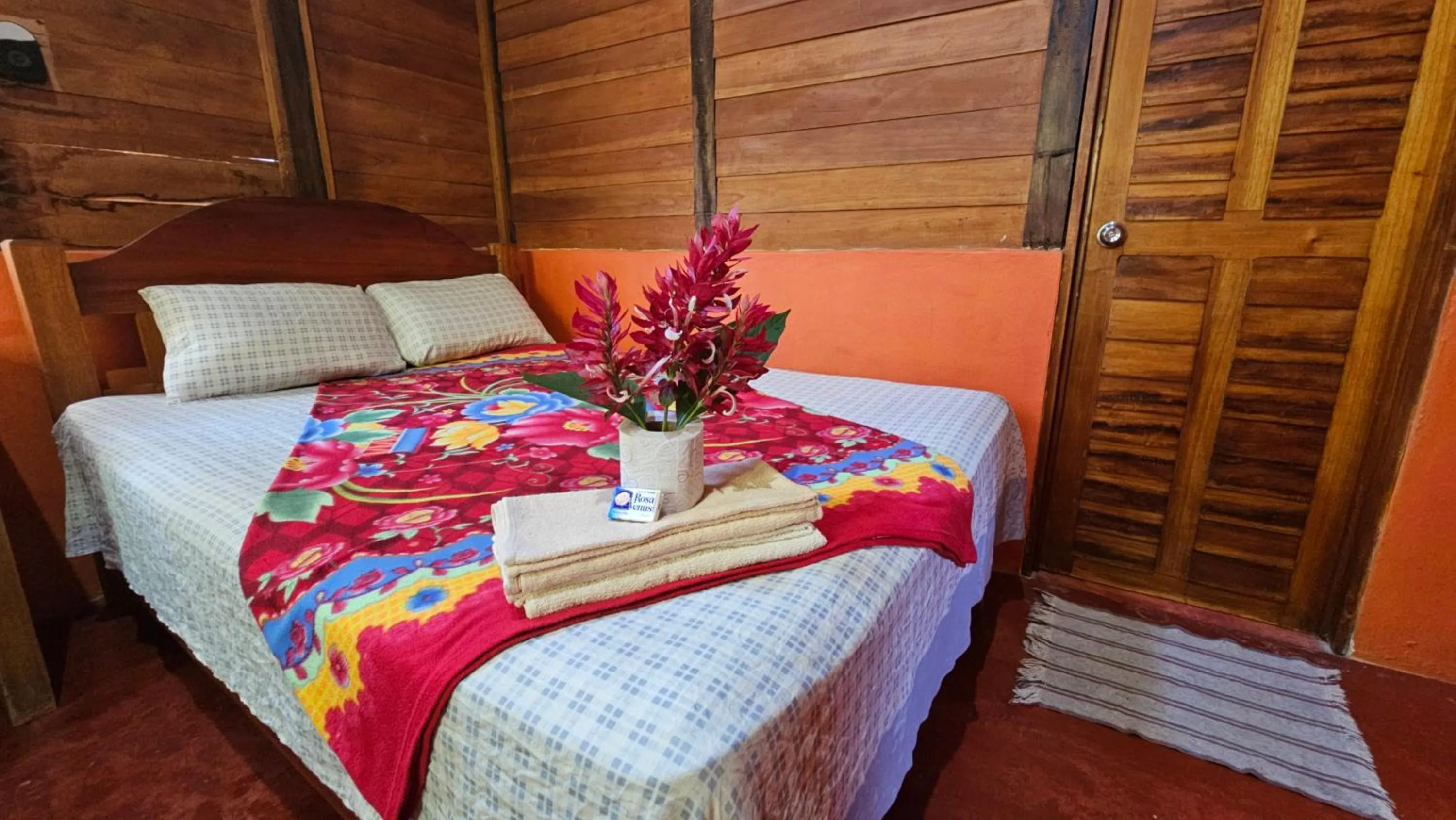 Bed in Cabañas Yax-ha