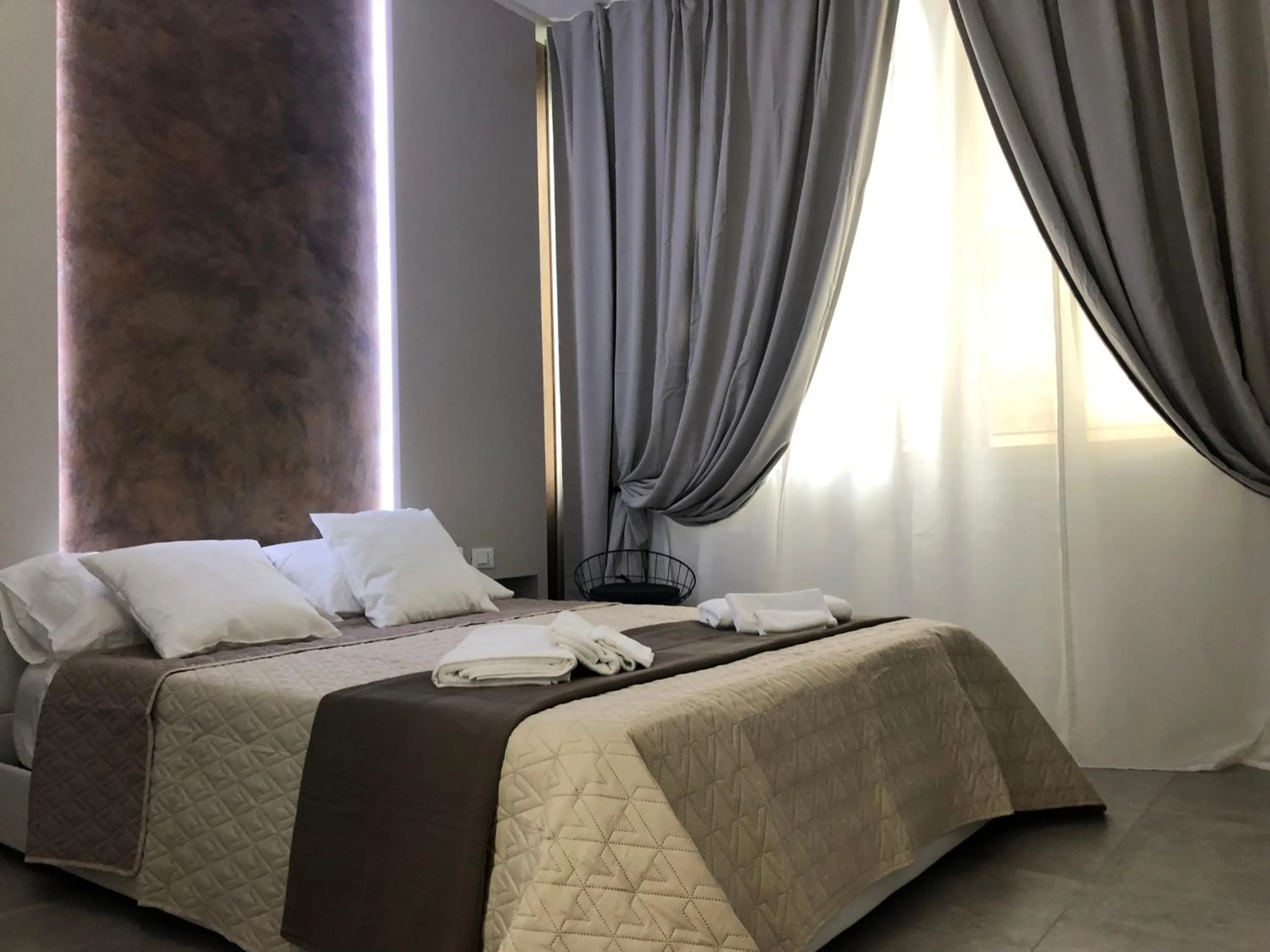 Bed in Turin Central Rooms