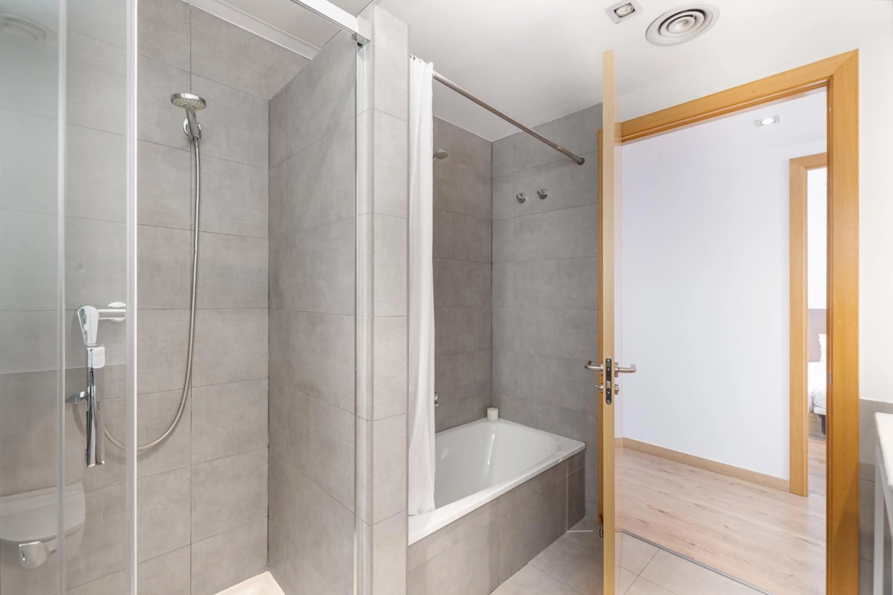 Bathroom in The Corner Apartments by Aspasios