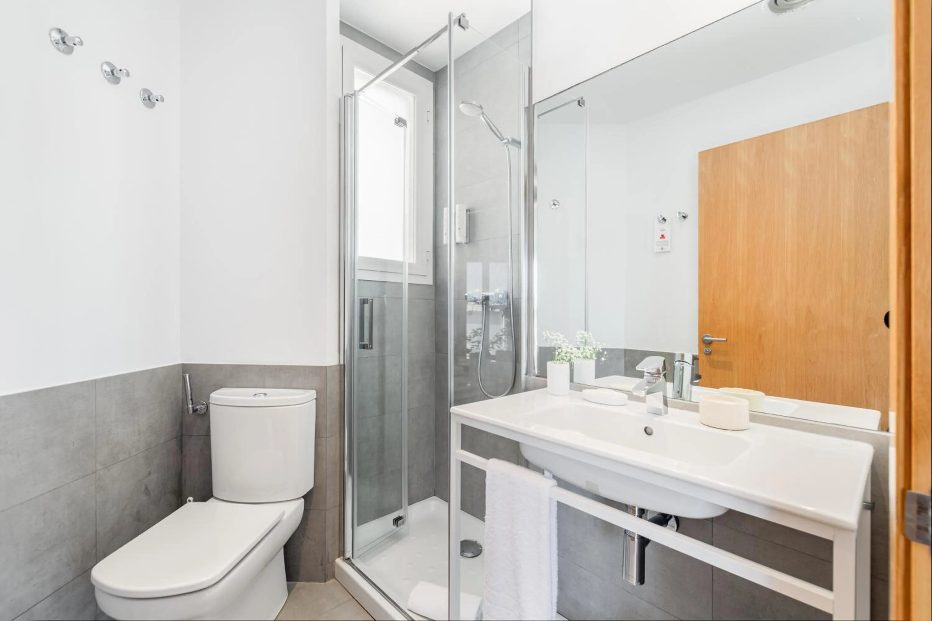 Bathroom in The Corner Apartments by Aspasios