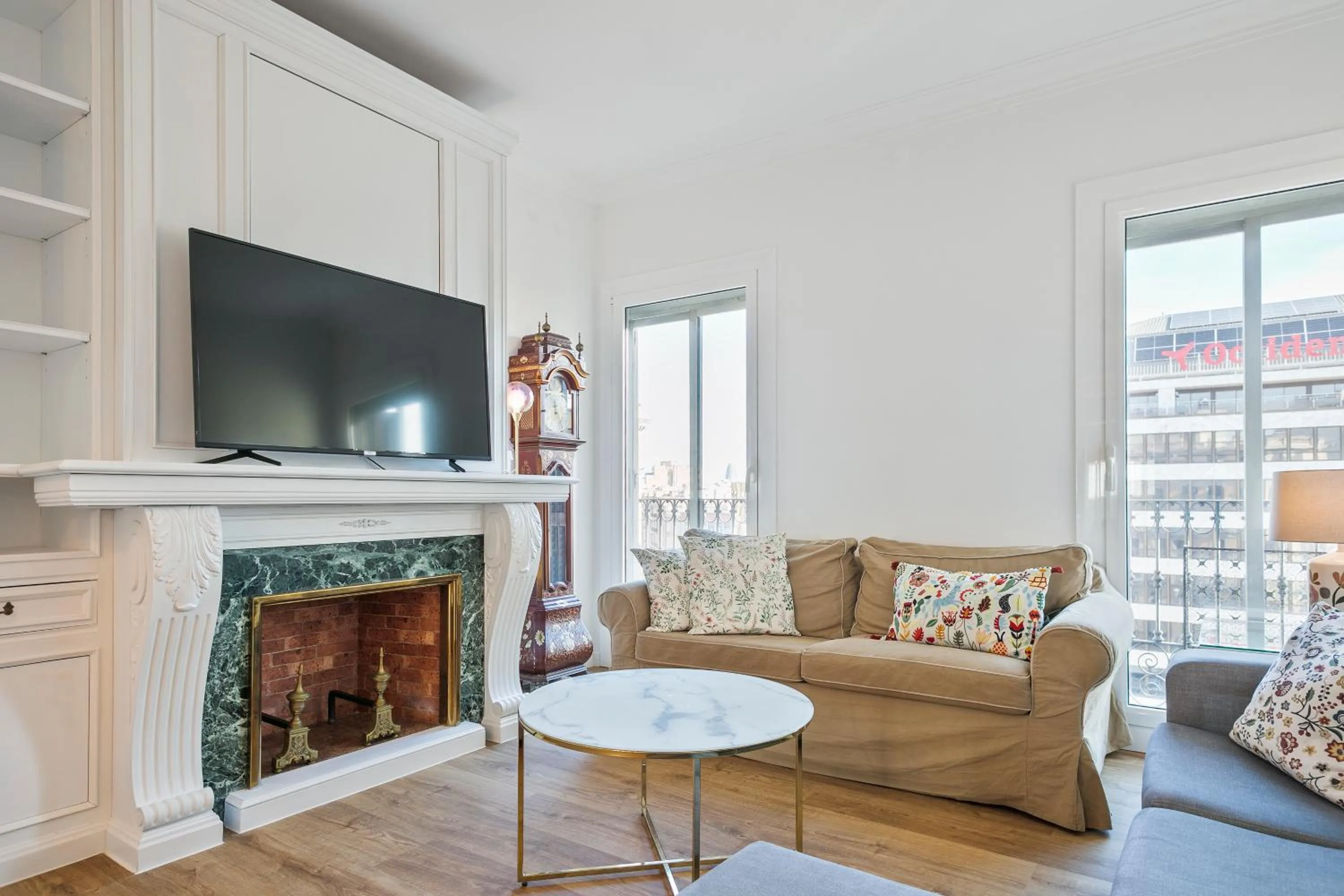 TV and multimedia in The Corner Apartments by Aspasios