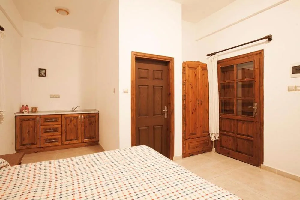 Bed in Glaro Garden Hotel