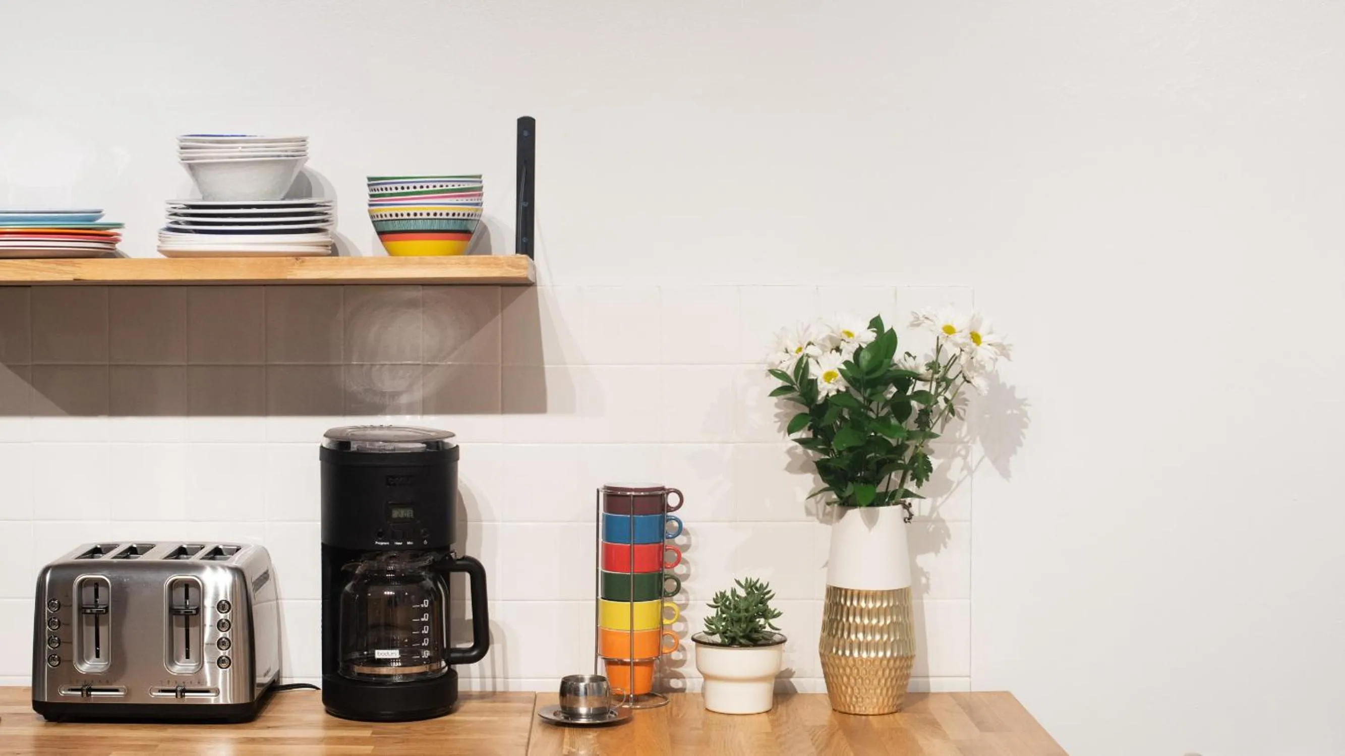 Communal kitchen in Santurcia Hostel