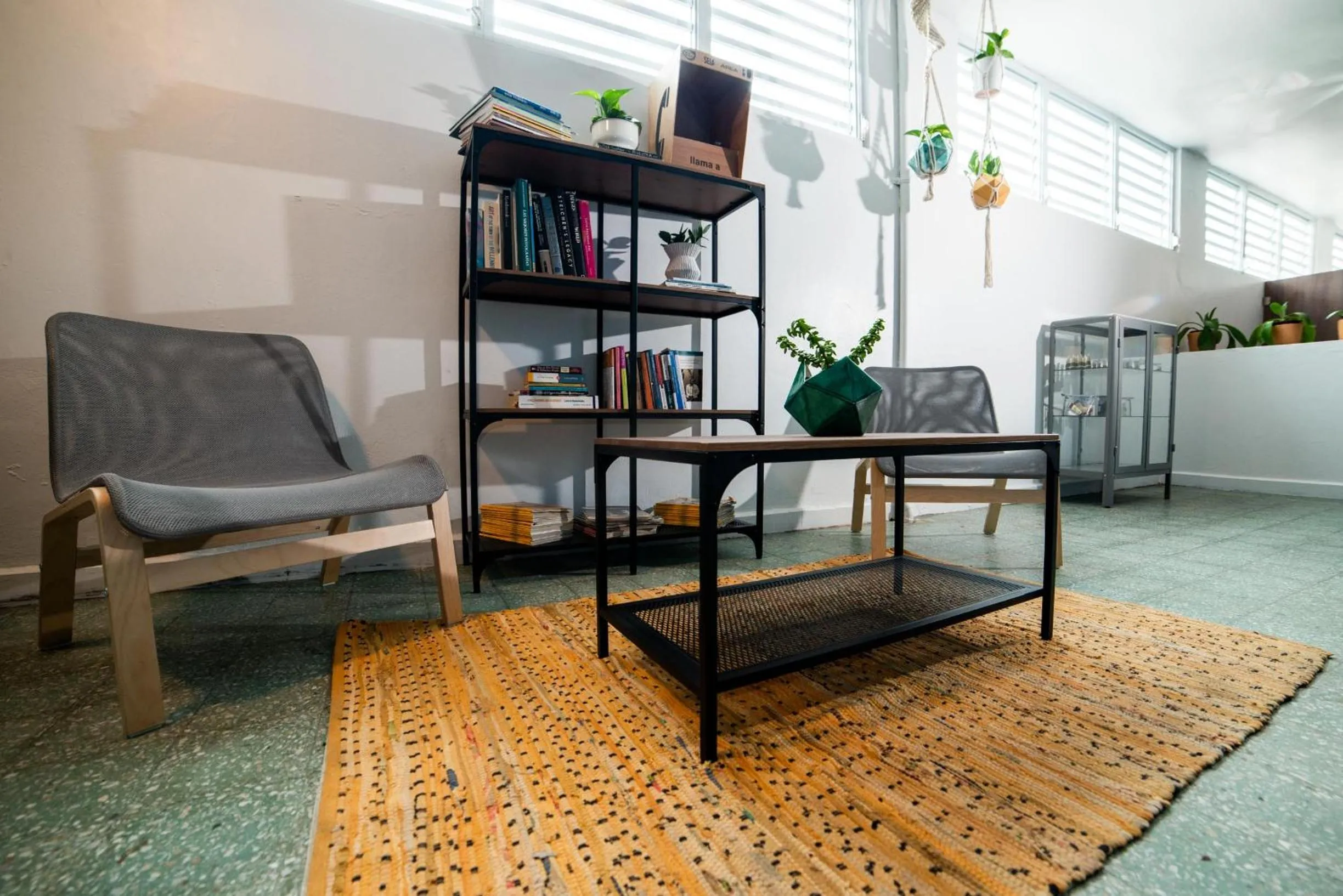 Communal lounge/ TV room in Santurcia Hostel