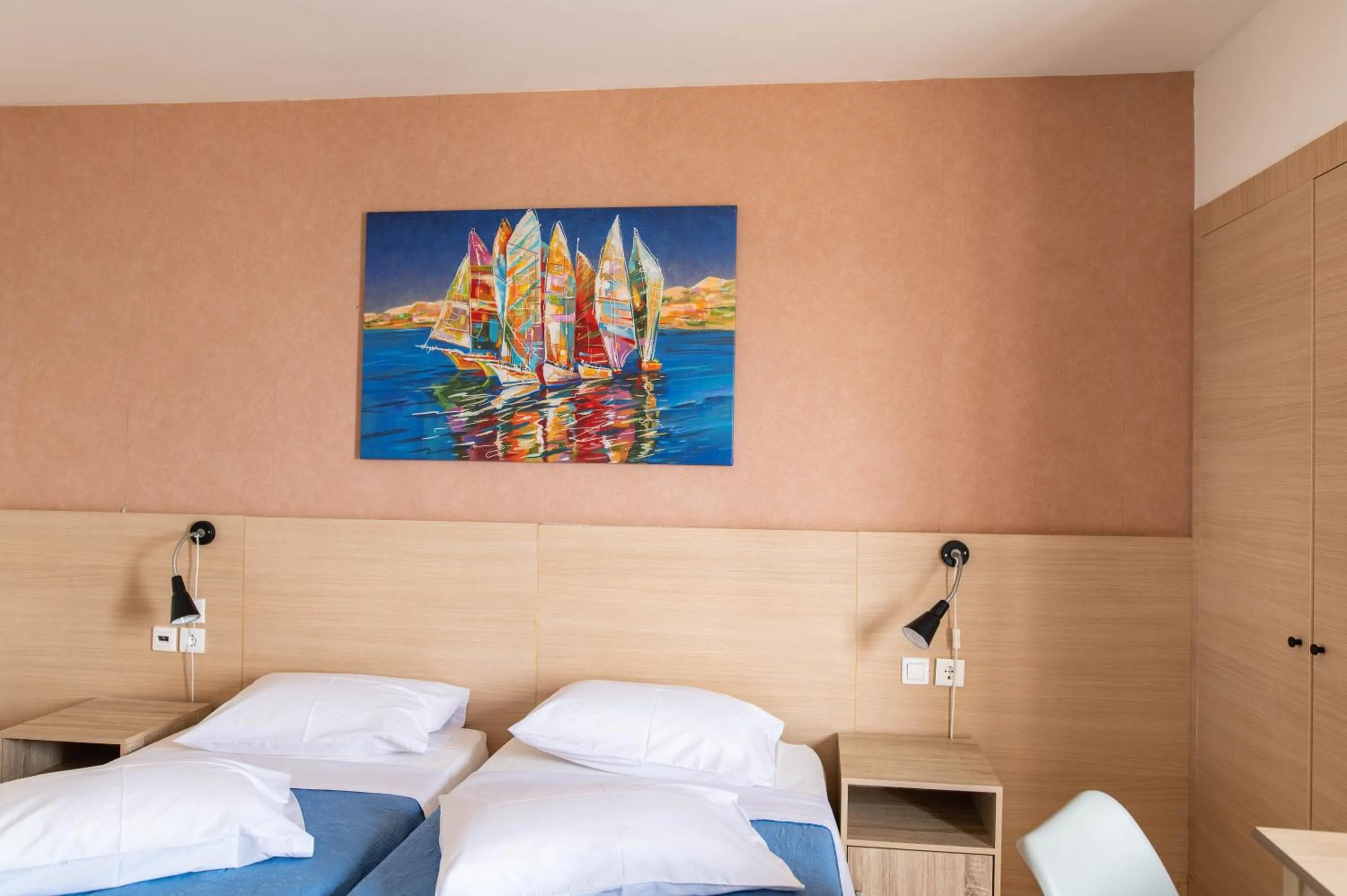 Bed in Achilleas Hotel Apartments