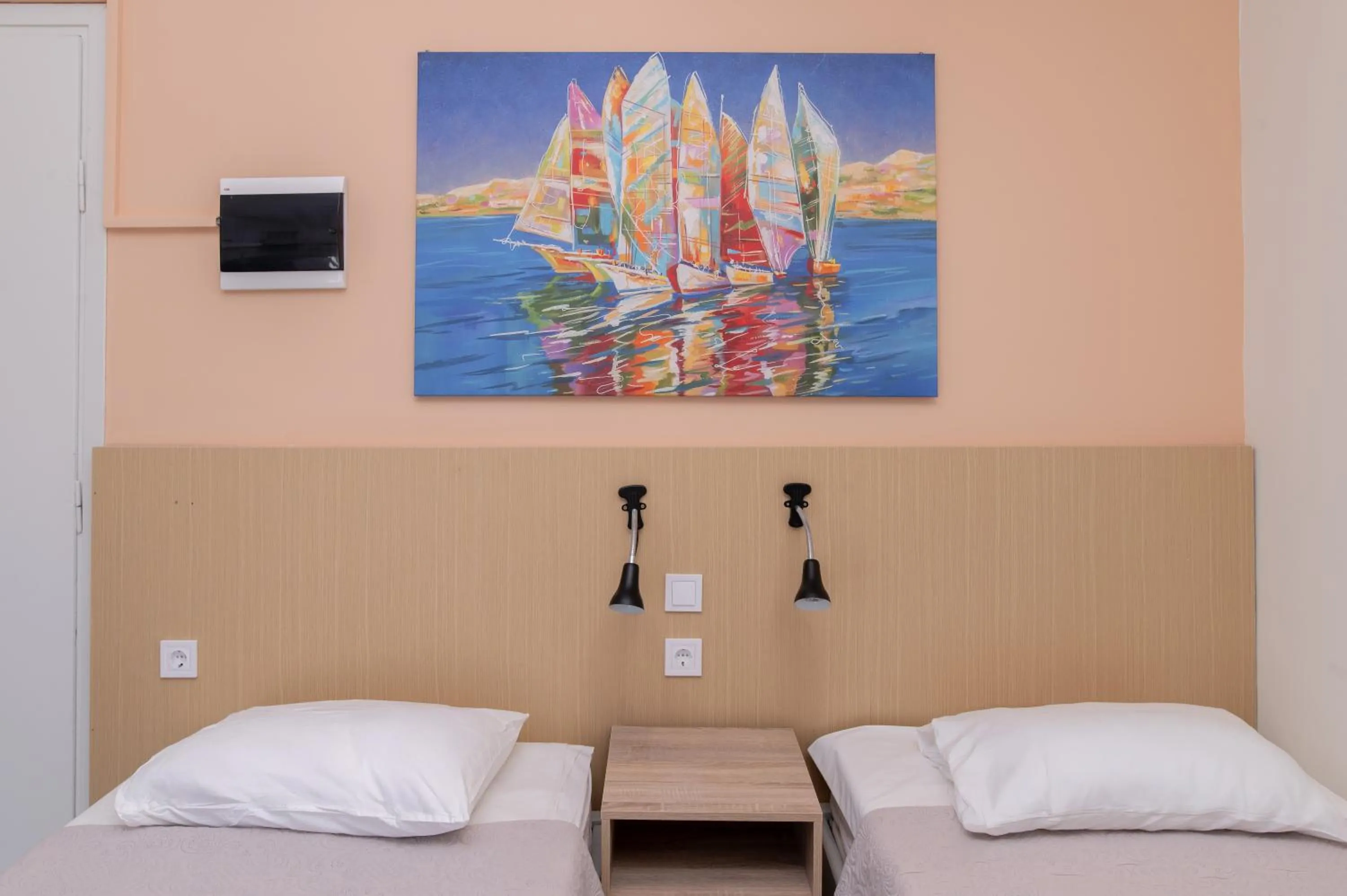 Bed in Achilleas Hotel Apartments