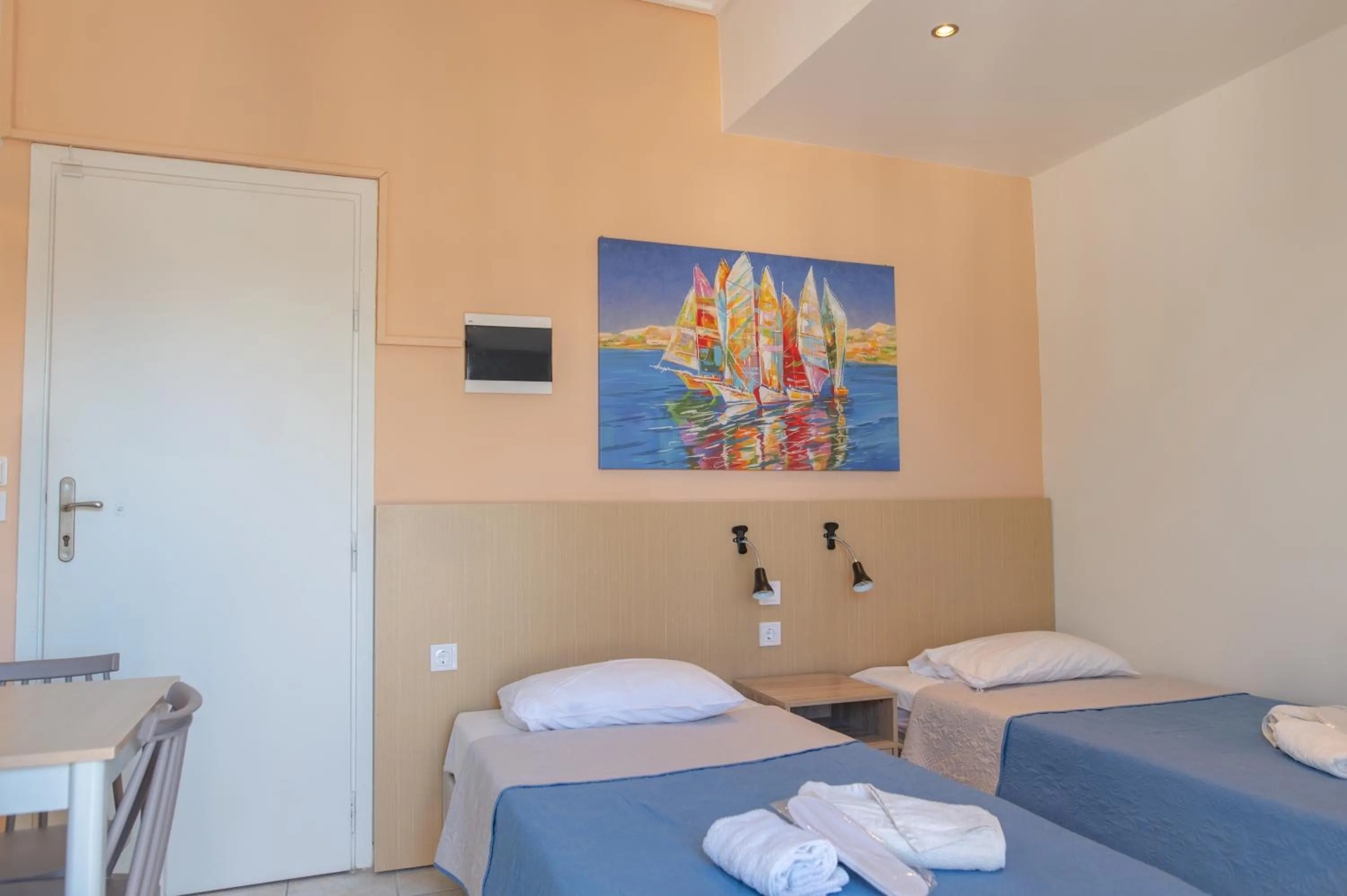 Bed in Achilleas Hotel Apartments