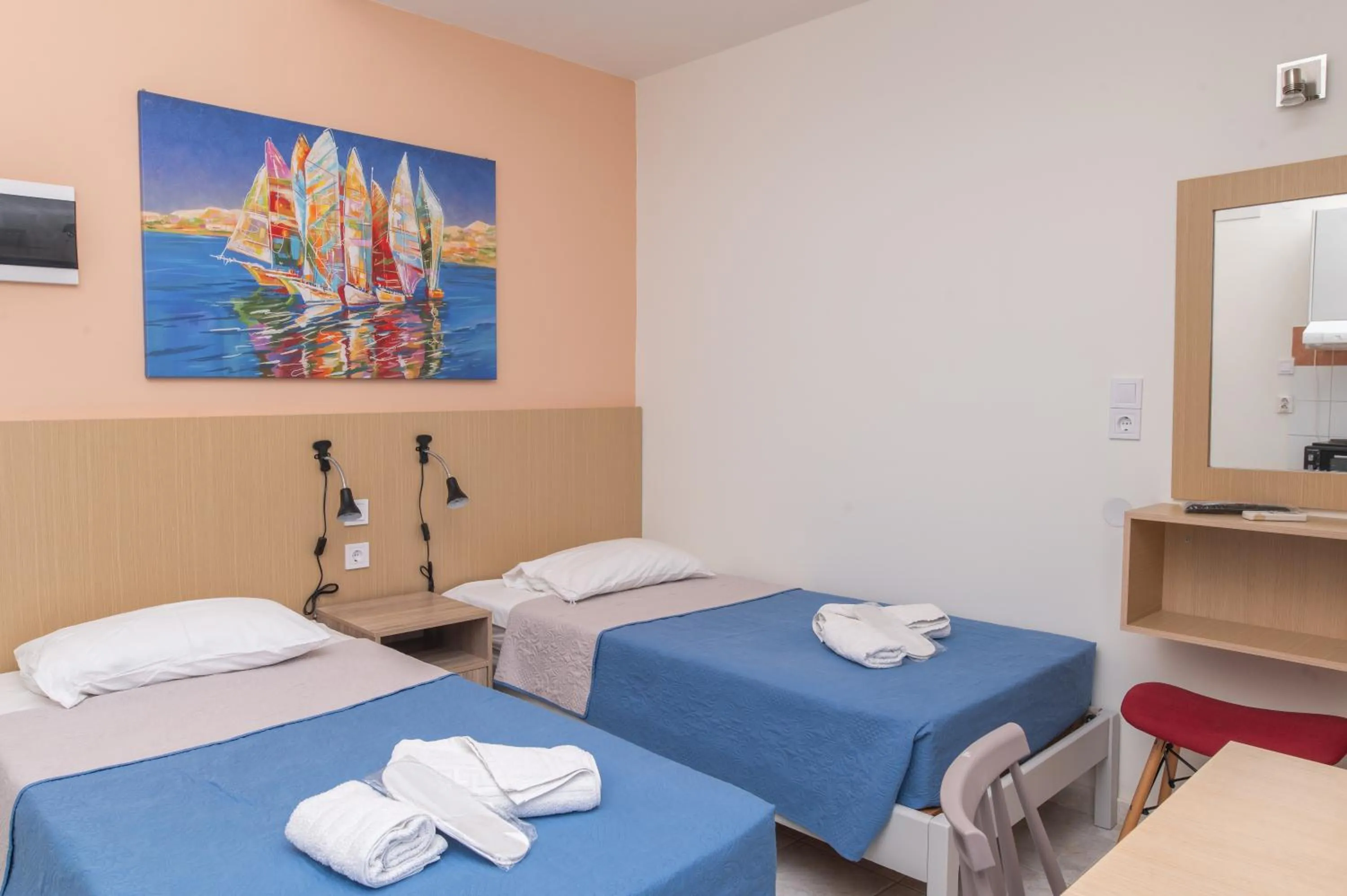 Bed in Achilleas Hotel Apartments