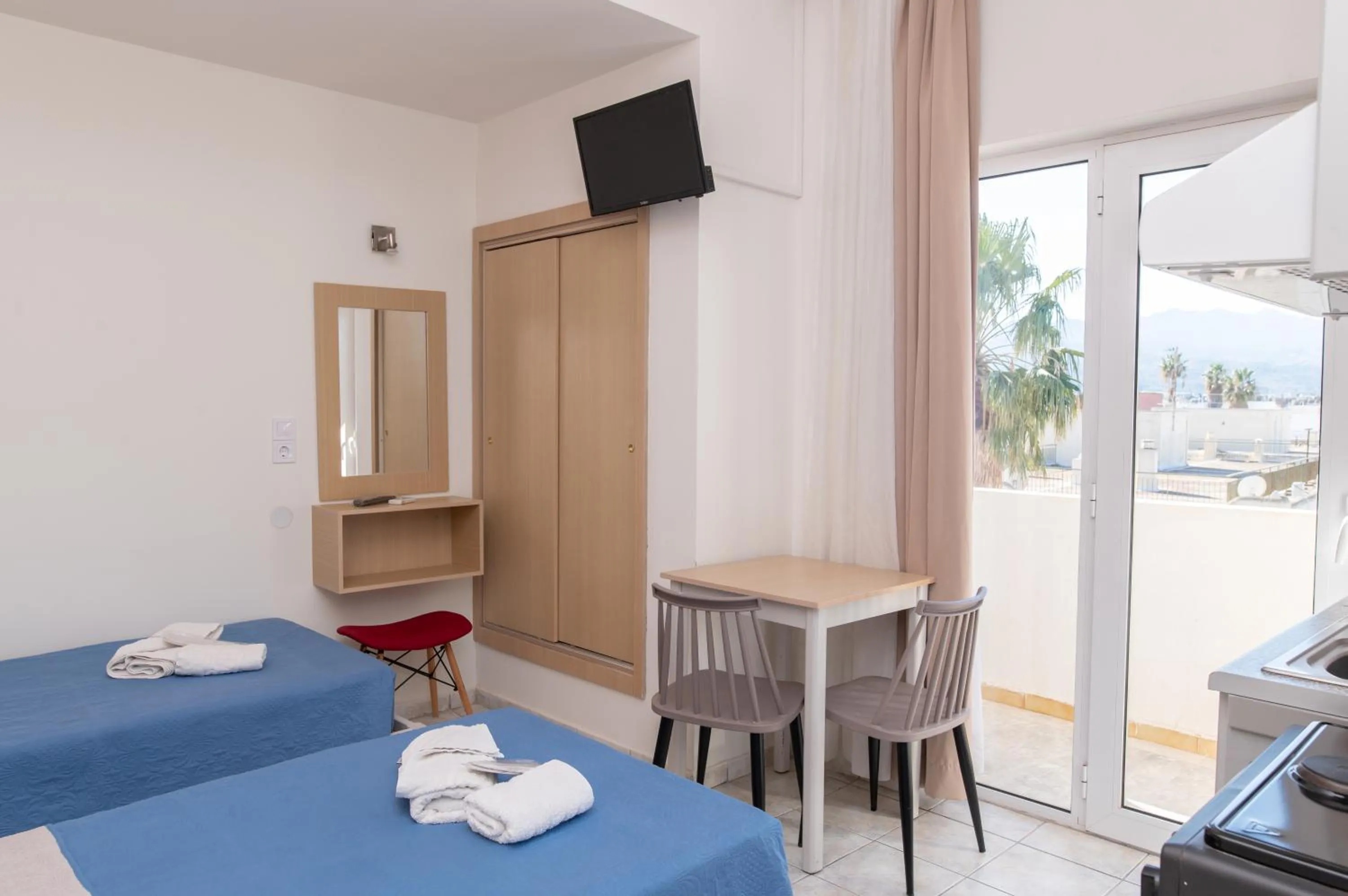 TV and multimedia, Bed in Achilleas Hotel Apartments