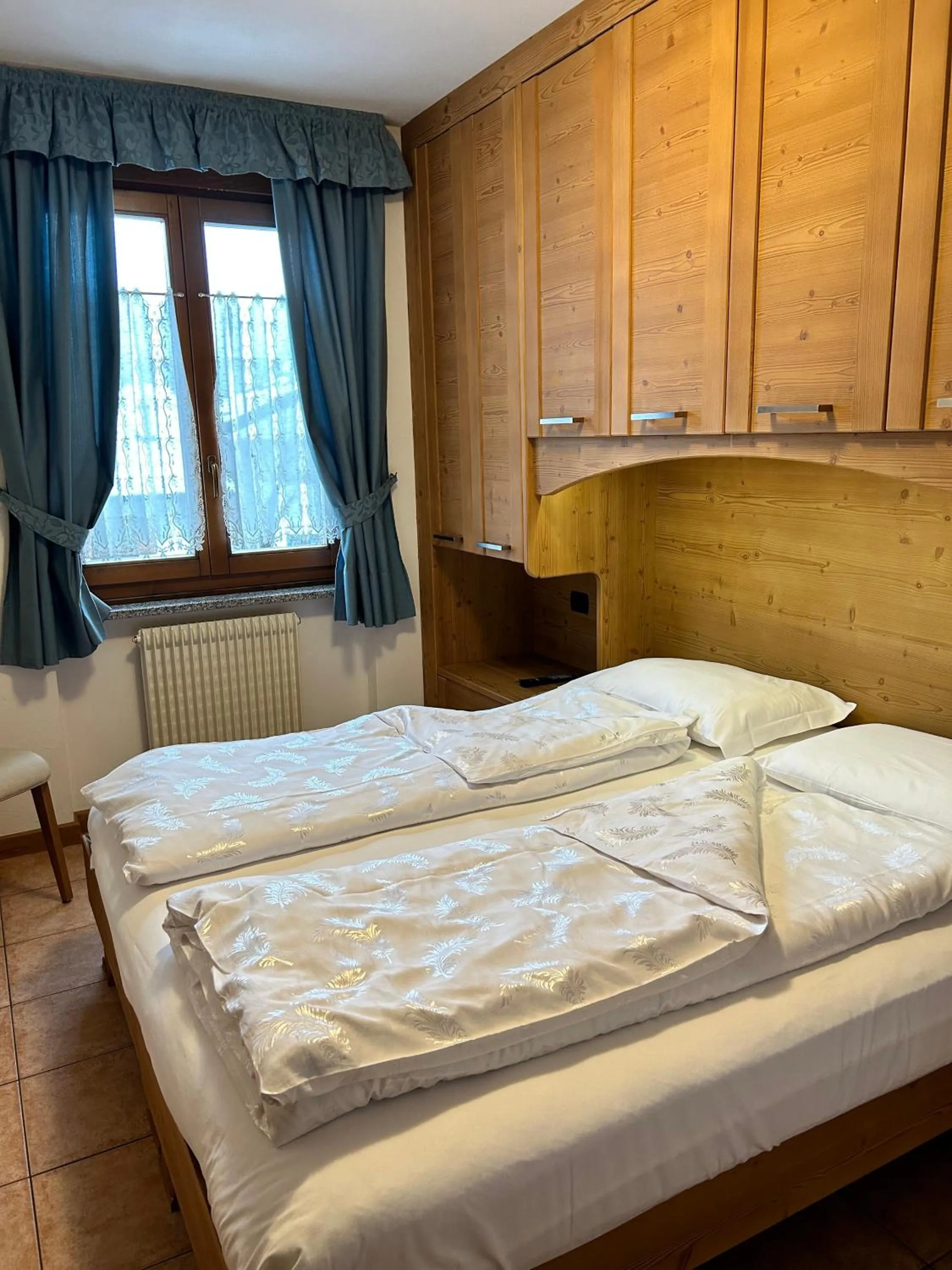 Photo of the whole room, Bed in Residence Cima Tosa